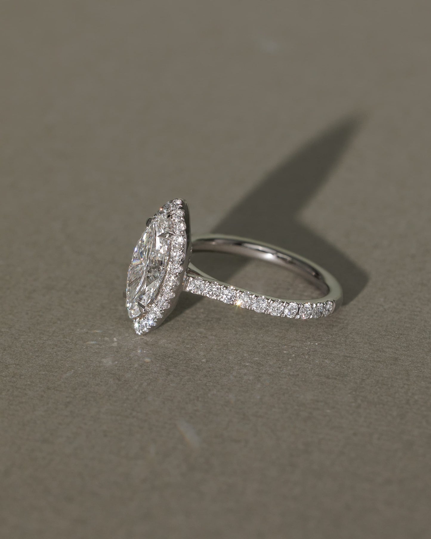 Stefania - Marquise Claw Solitaire with Halo and Pave Band and Cathedral High Setting Engagement Ring - White Gold