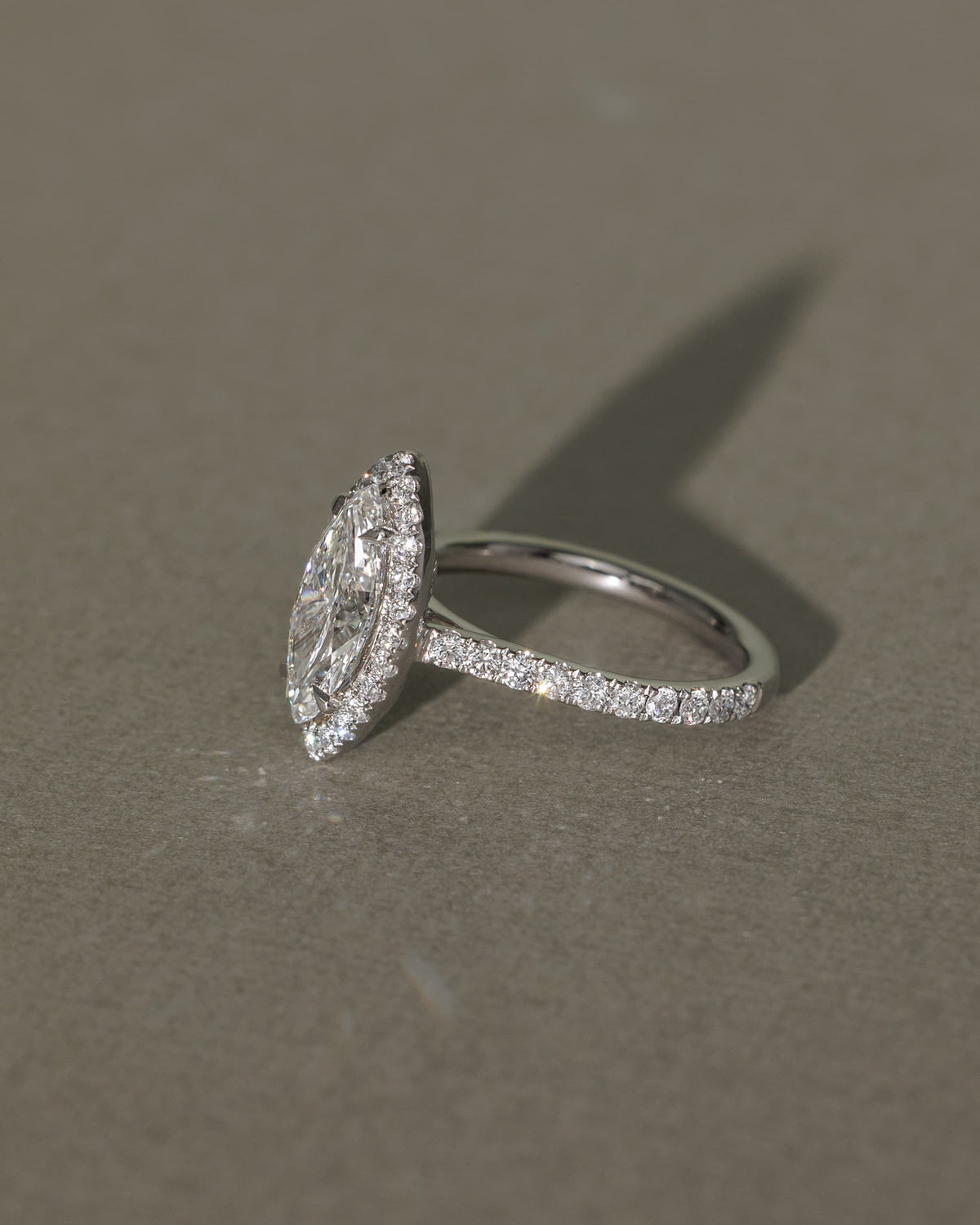 Stefania - Marquise Claw Solitaire with Halo and Pave Band and Cathedral High Setting Engagement Ring - Yellow Gold
