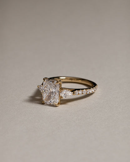 Bree - Elongated Cushion Claw Trilogy with Pear Side Stones and Pave Band Engagement Ring - Yellow Gold
