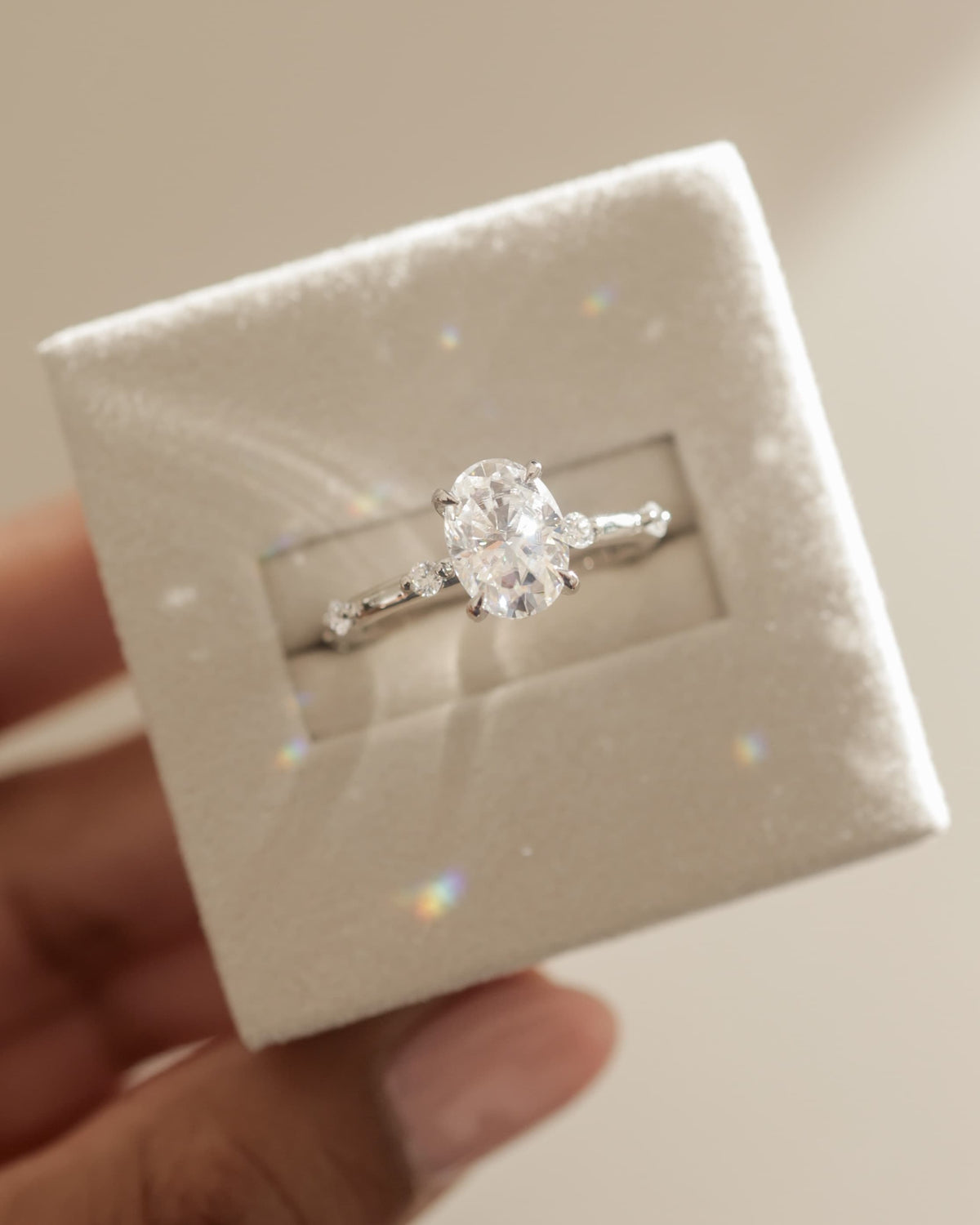Elise - Oval Claw Solitaire with 6 Spaced Round Accent Stones and Hidden Halo Engagement Ring - Yellow Gold
