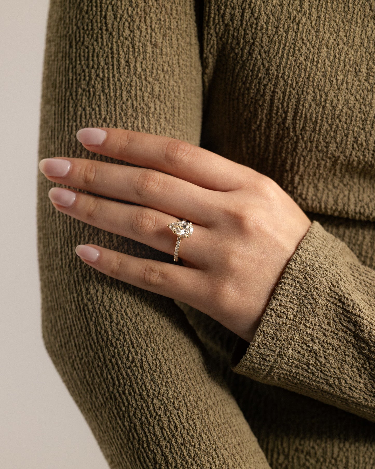 Jordanna - Pear Claw Solitaire with Wrap Around Hidden Halo and Pave Band Engagement Ring - Yellow Gold