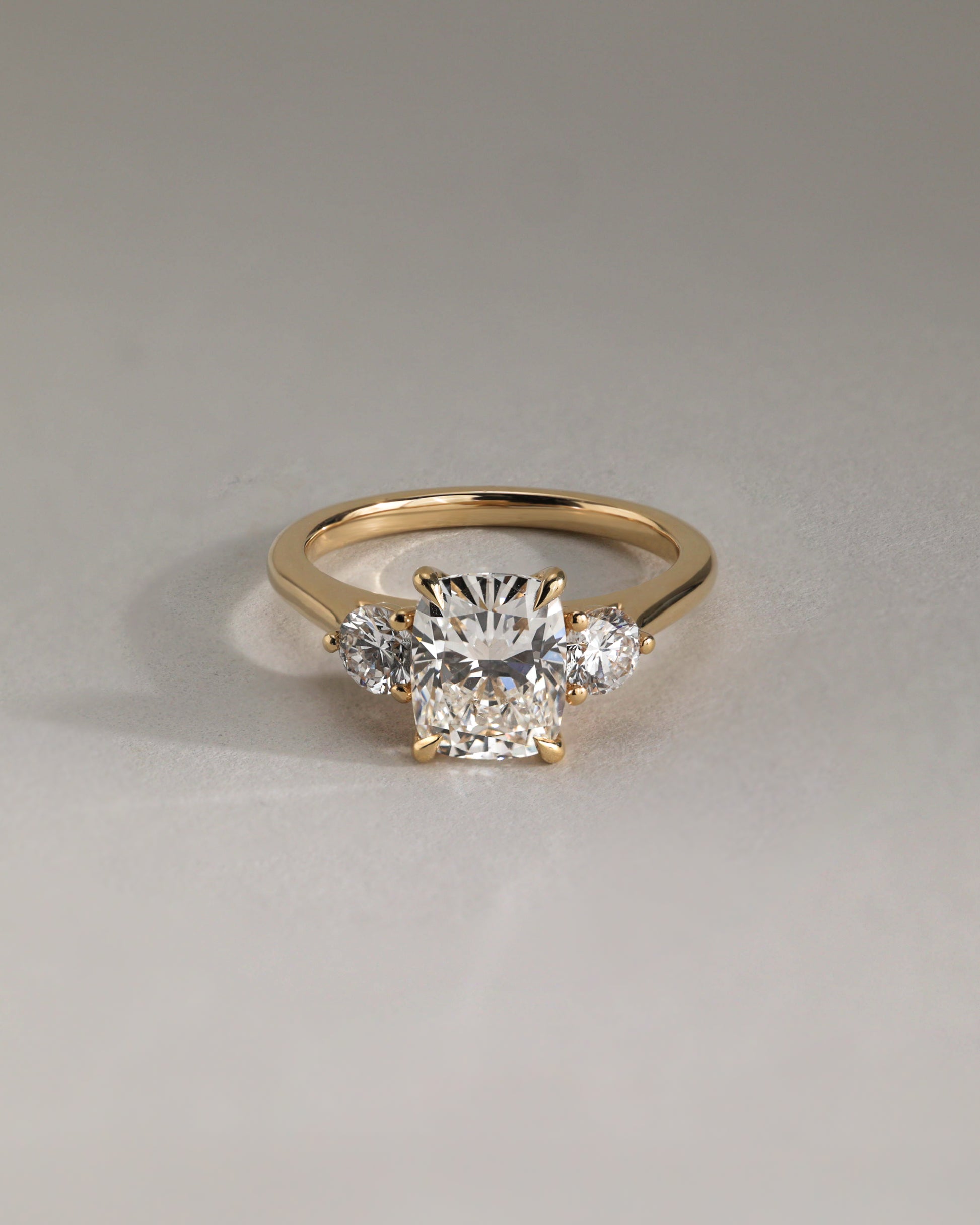 Charmaine - Elongated Cushion Claw Trilogy with Round Side Stones and Lily Detail Engagement Ring - Rose Two-Tone - Lifestyle