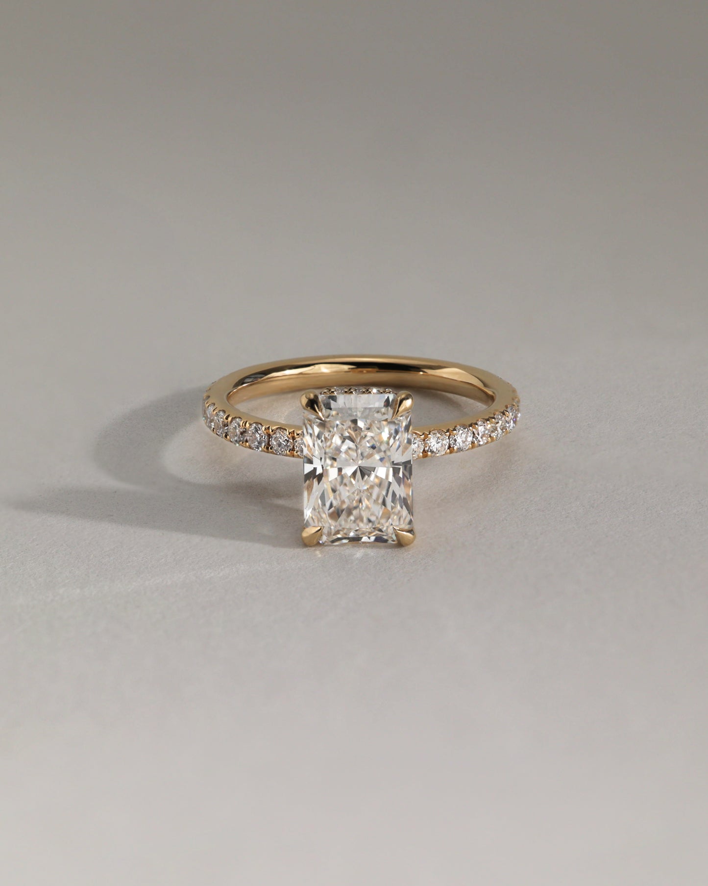 Ellie - Radiant Claw Solitaire with Wrap Around Hidden Halo and Pave Band Engagement Ring - Rose Two-Tone - Lifestyle