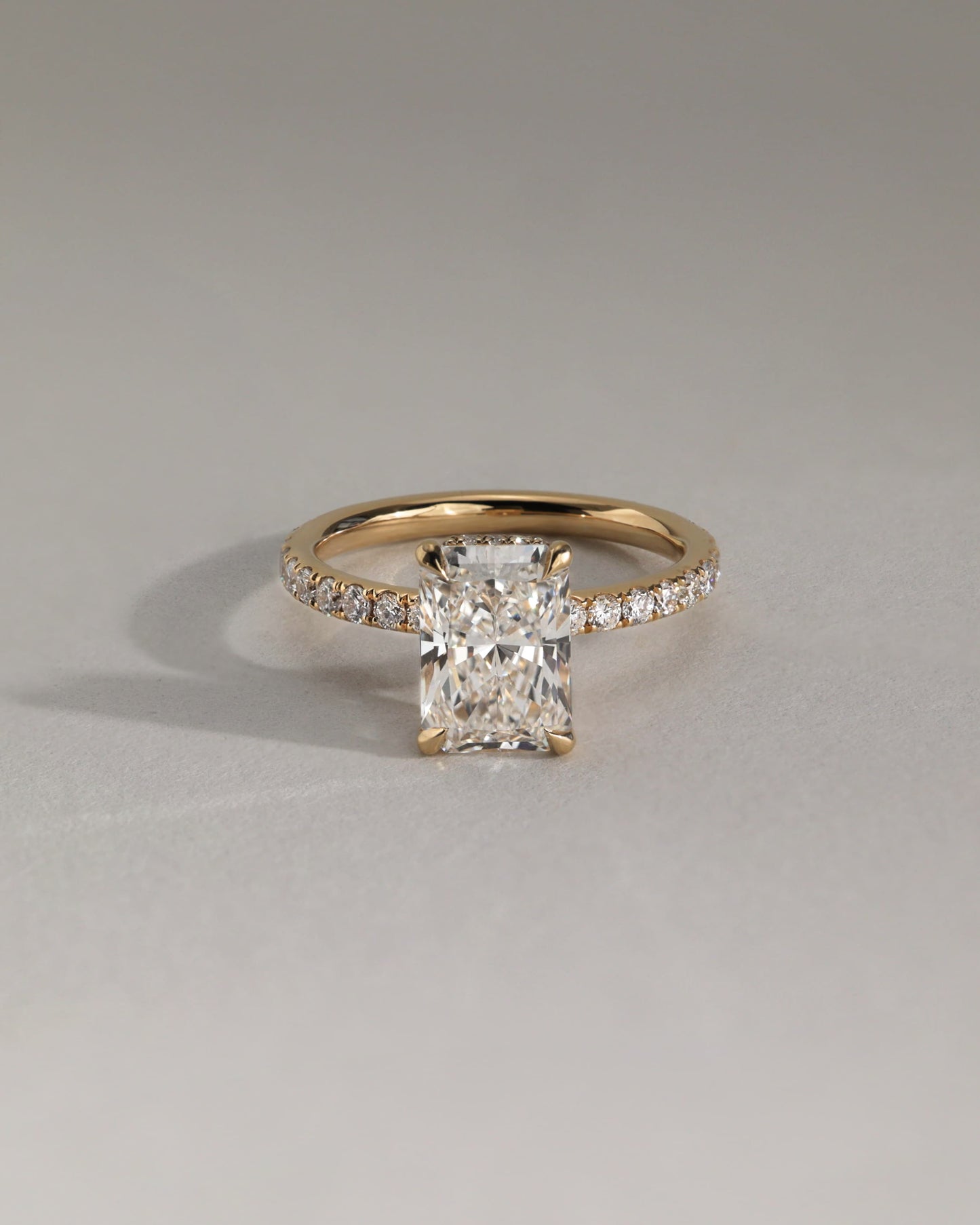 Ellie - Radiant Claw Solitaire with Wrap Around Hidden Halo and Pave Band Engagement Ring - Rose Two-Tone