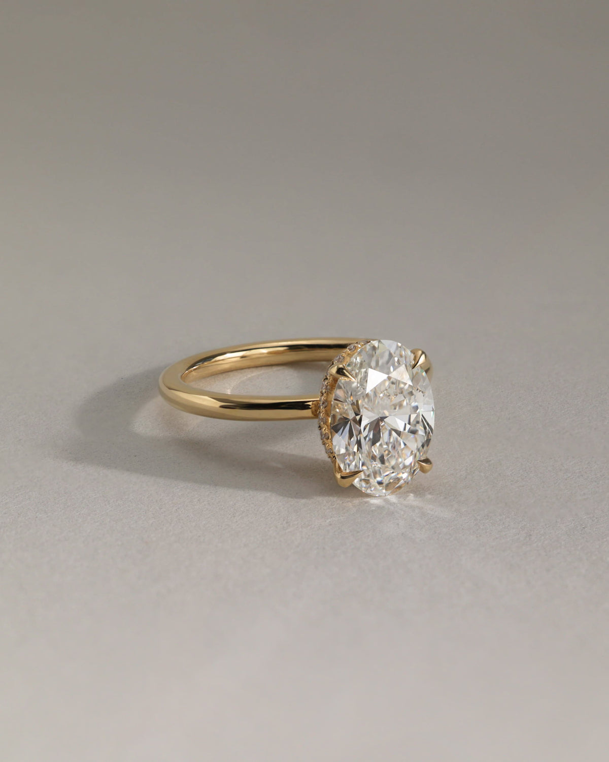 Cecilia - Oval Claw Solitaire with Wrap Around Hidden Halo Engagement Ring - Yellow Two-Tone
