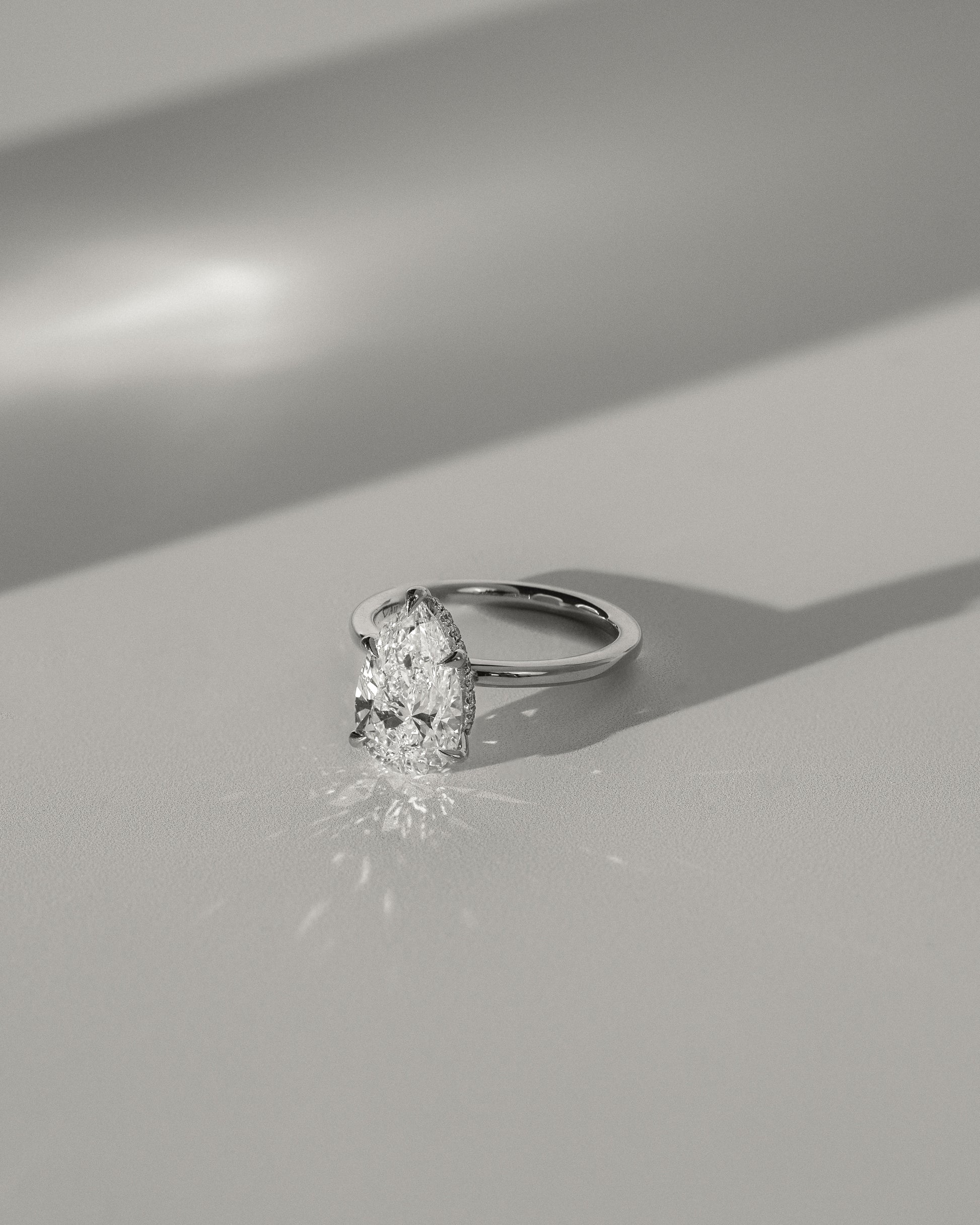 Ainsley - Pear Claw Solitaire with Wrap Around Hidden Halo Engagement Ring - Rose Two-Tone - Lifestyle