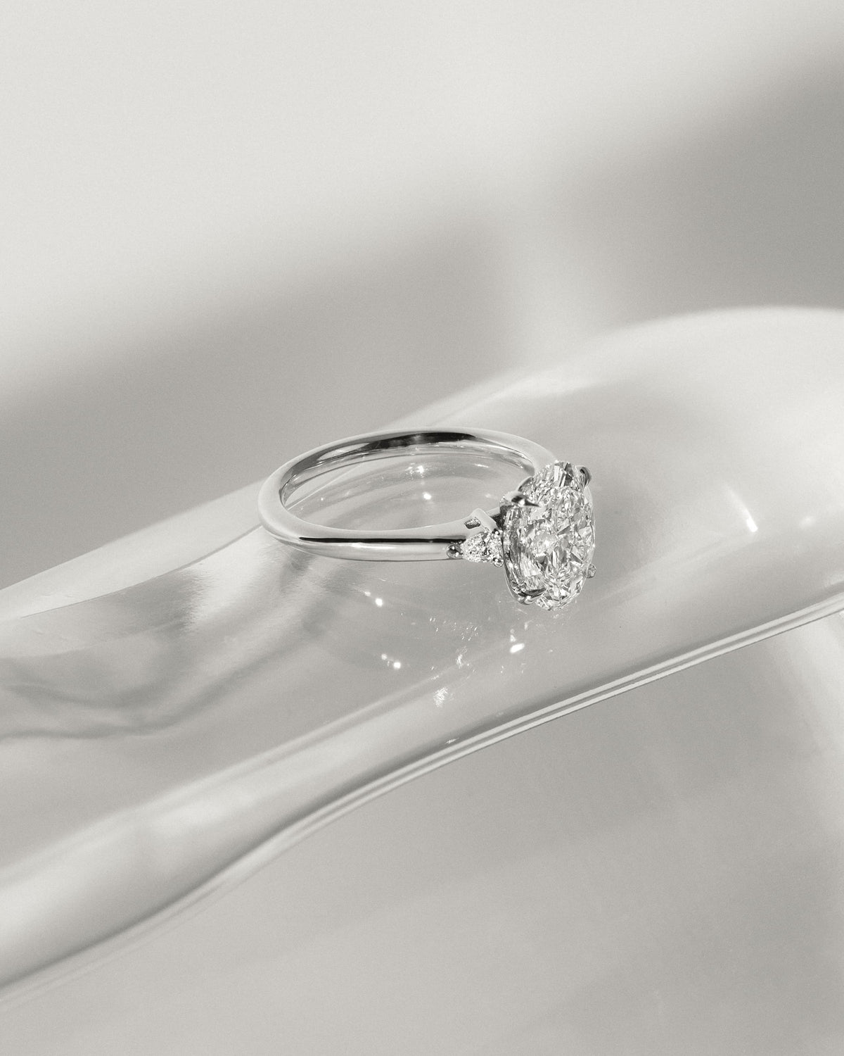 Elena - Oval Claw Trilogy with Pear Side Stones and Tulip Detail Engagement Ring - Yellow Gold