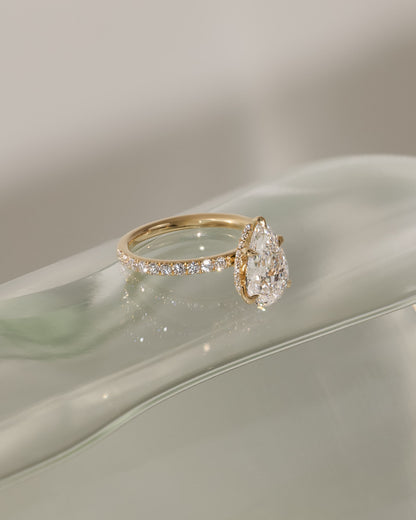 Jordanna - Pear Claw Solitaire with Wrap Around Hidden Halo and Pave Band Engagement Ring - Yellow Gold