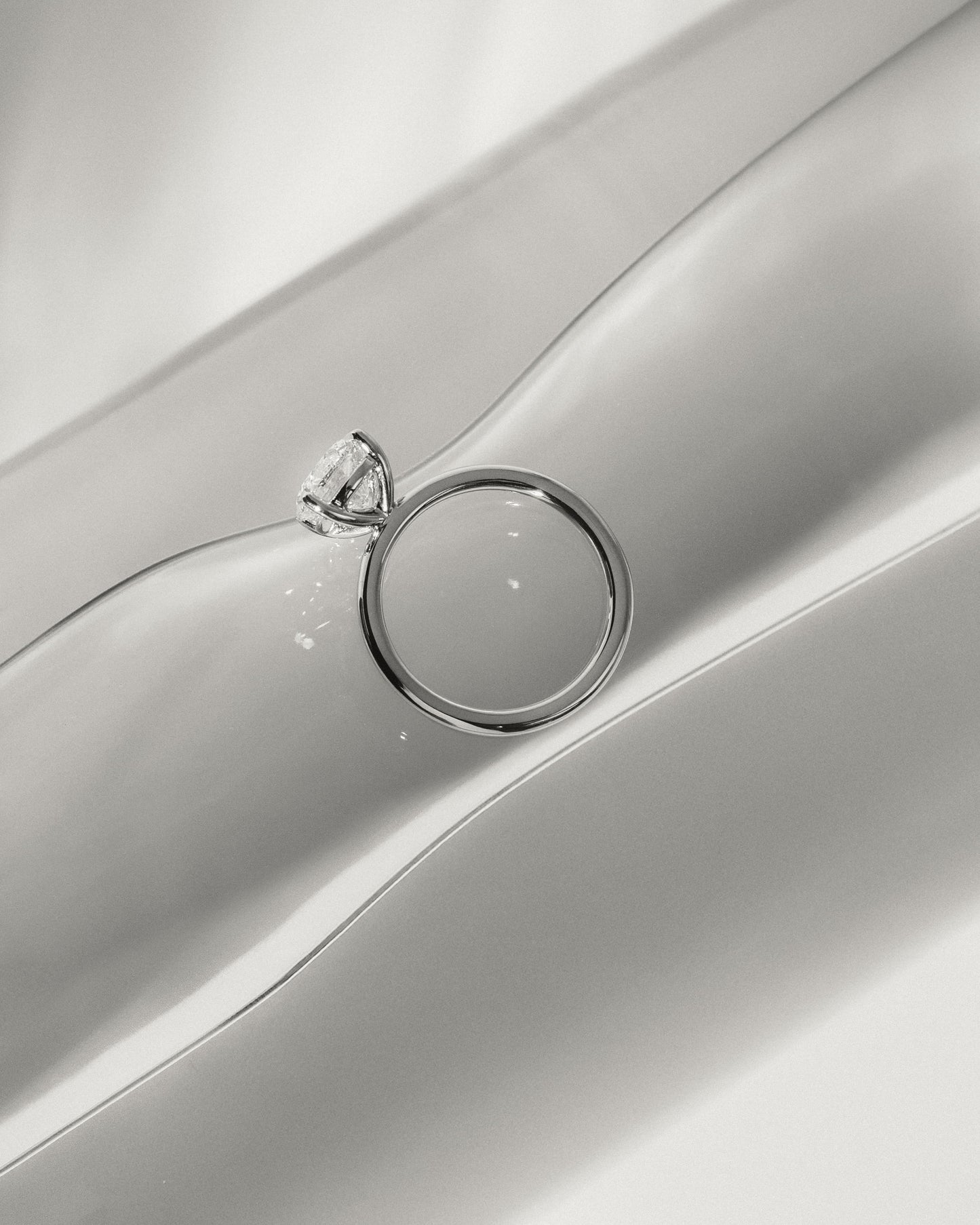 Lilly - Round Claw Solitaire Engagement Ring - Platinum