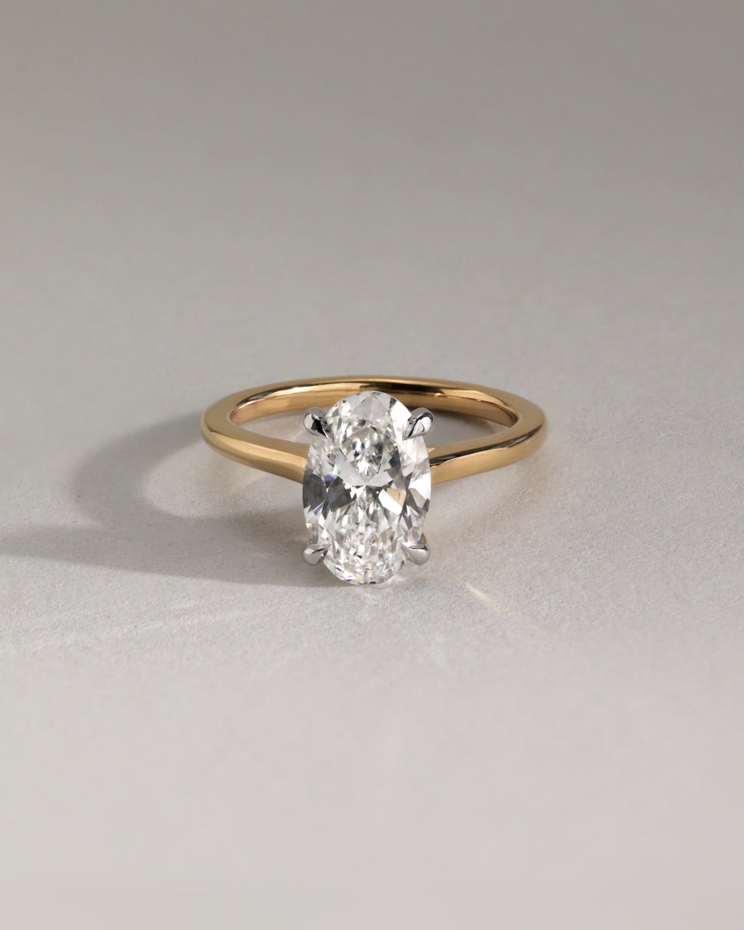 Scarlett - Oval Claw Solitaire with Hidden Halo and Cathedral High Setting Engagement Ring - Platinum