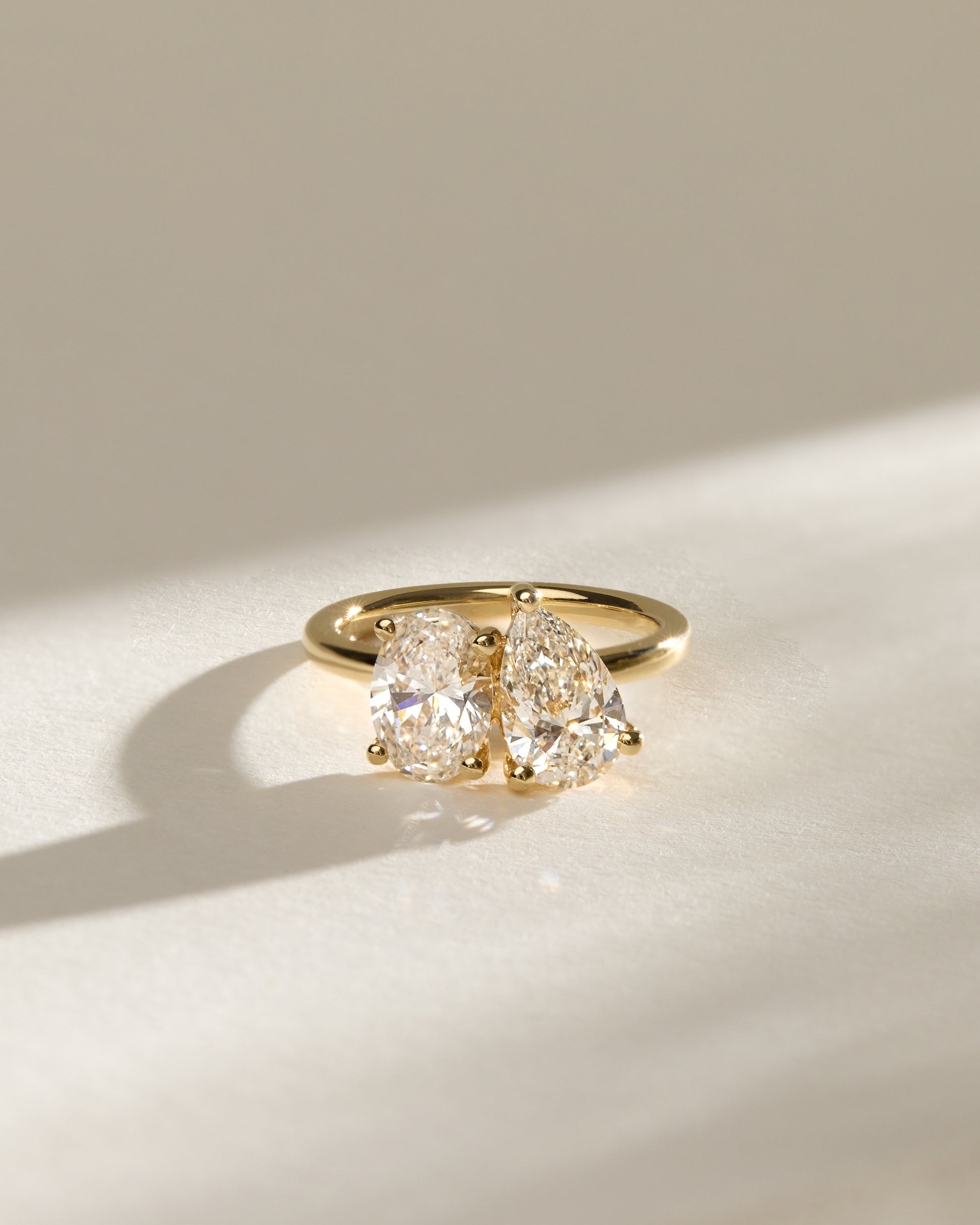 April - Pear and Oval Claw Toi et Moi Engagement Ring - Rose Two-Tone - Lifestyle