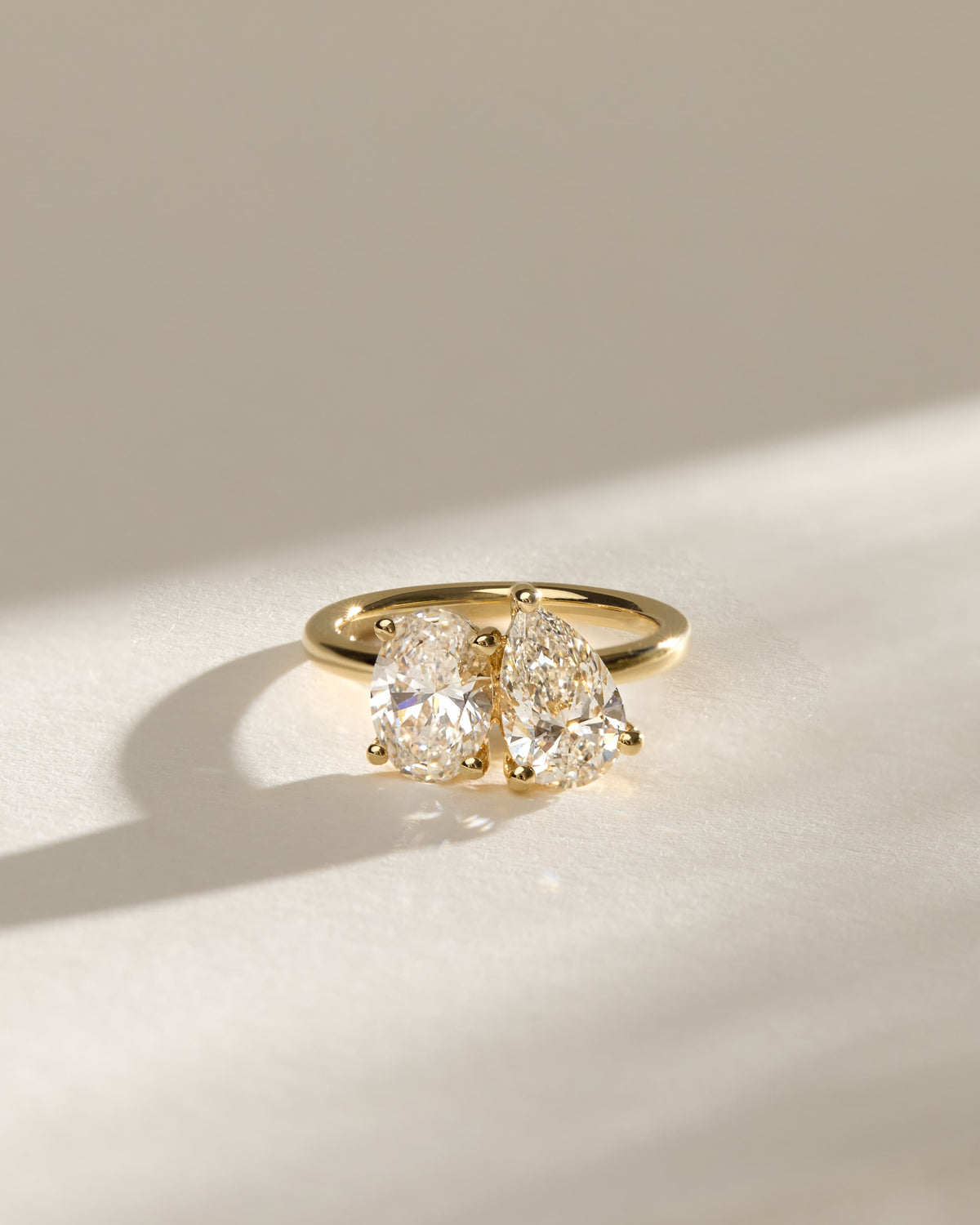 April - Pear and Oval Claw Toi et Moi Engagement Ring - Yellow Two-Tone - yellow two-tone - Lara Jewels