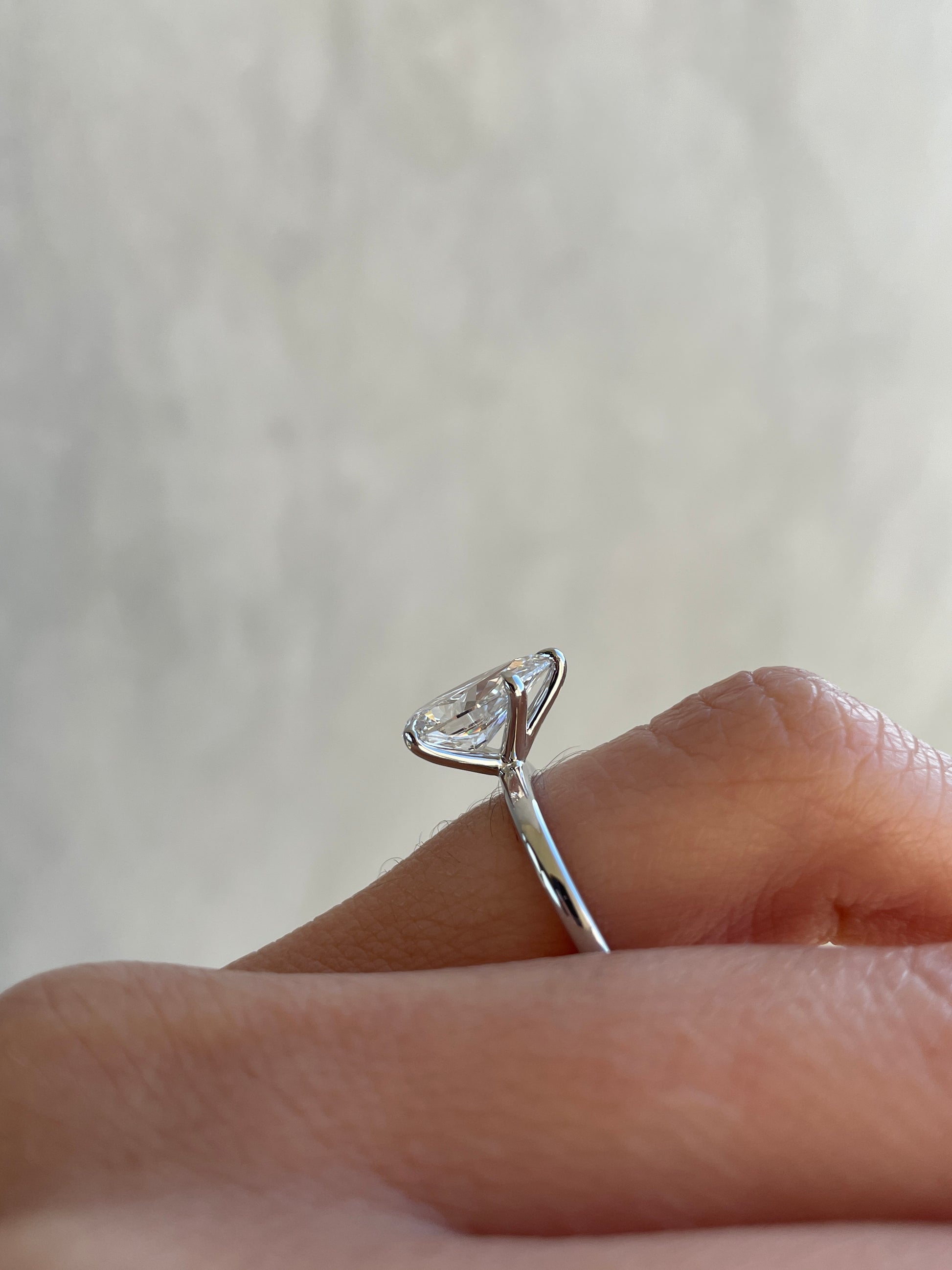 Alia - Pear Claw Solitaire Engagement Ring - Rose Two-Tone - Lifestyle