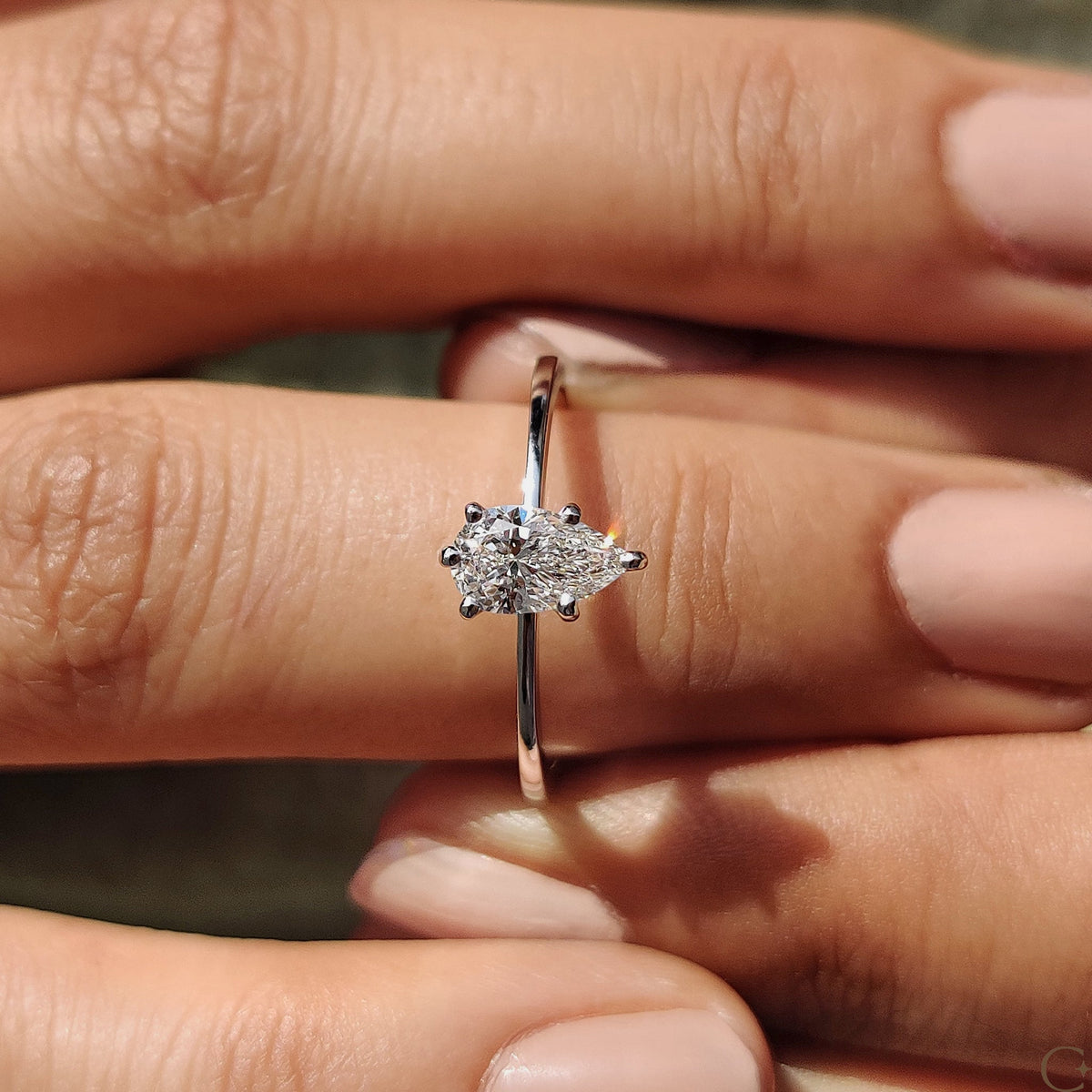Pear Shaped Diamond Ring In Solitaire Style