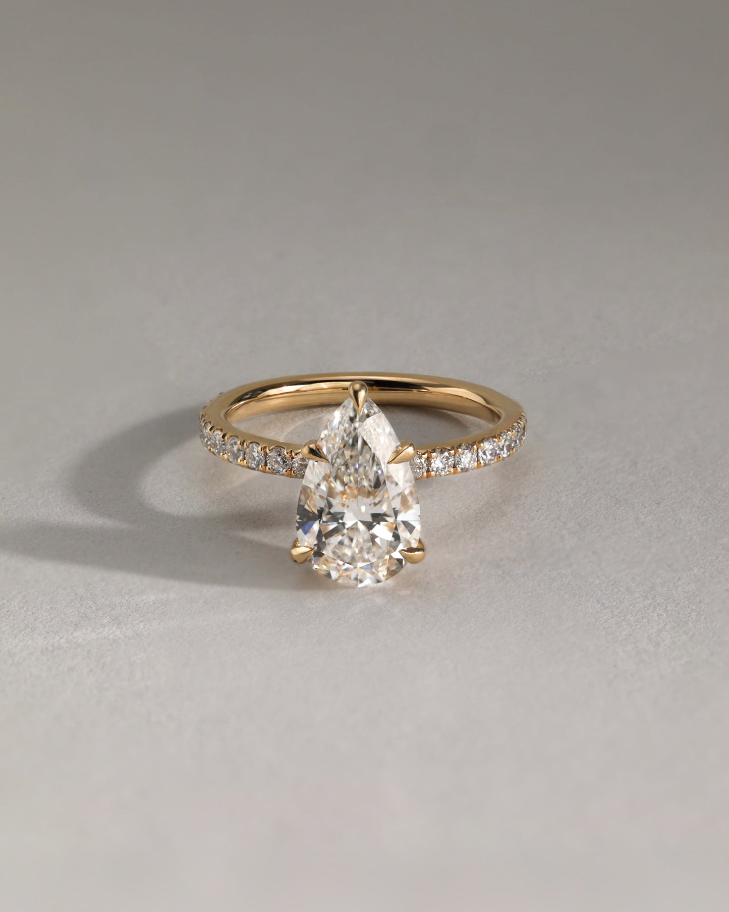 Jordanna - Pear Claw Solitaire with Wrap Around Hidden Halo and Pave Band Engagement Ring - Rose Two-Tone