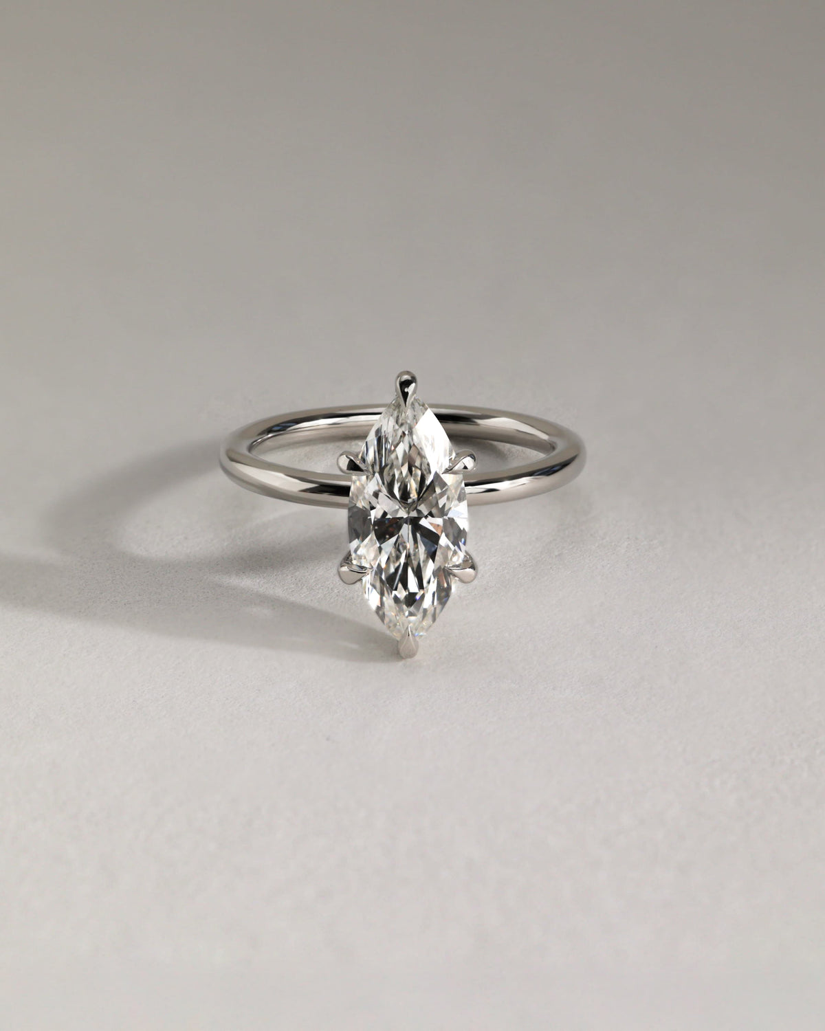Zariyah - Marquise Claw Solitaire with Hidden Halo Engagement Ring - Rose Two-Tone