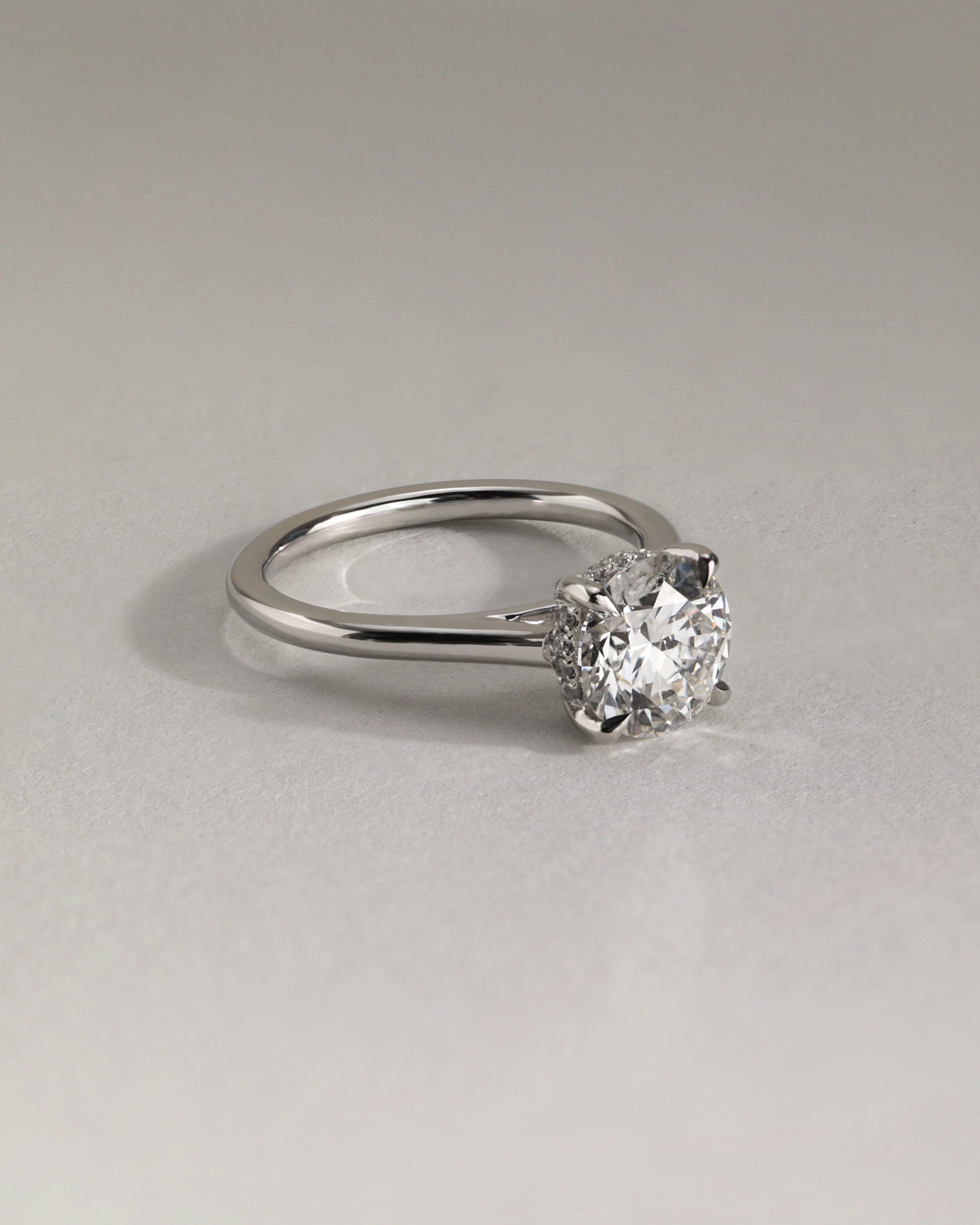 Bonnie - Round Claw Solitaire with Hidden Halo and Cathedral High Setting Engagement Ring - Rose Two-Tone - Lifestyle