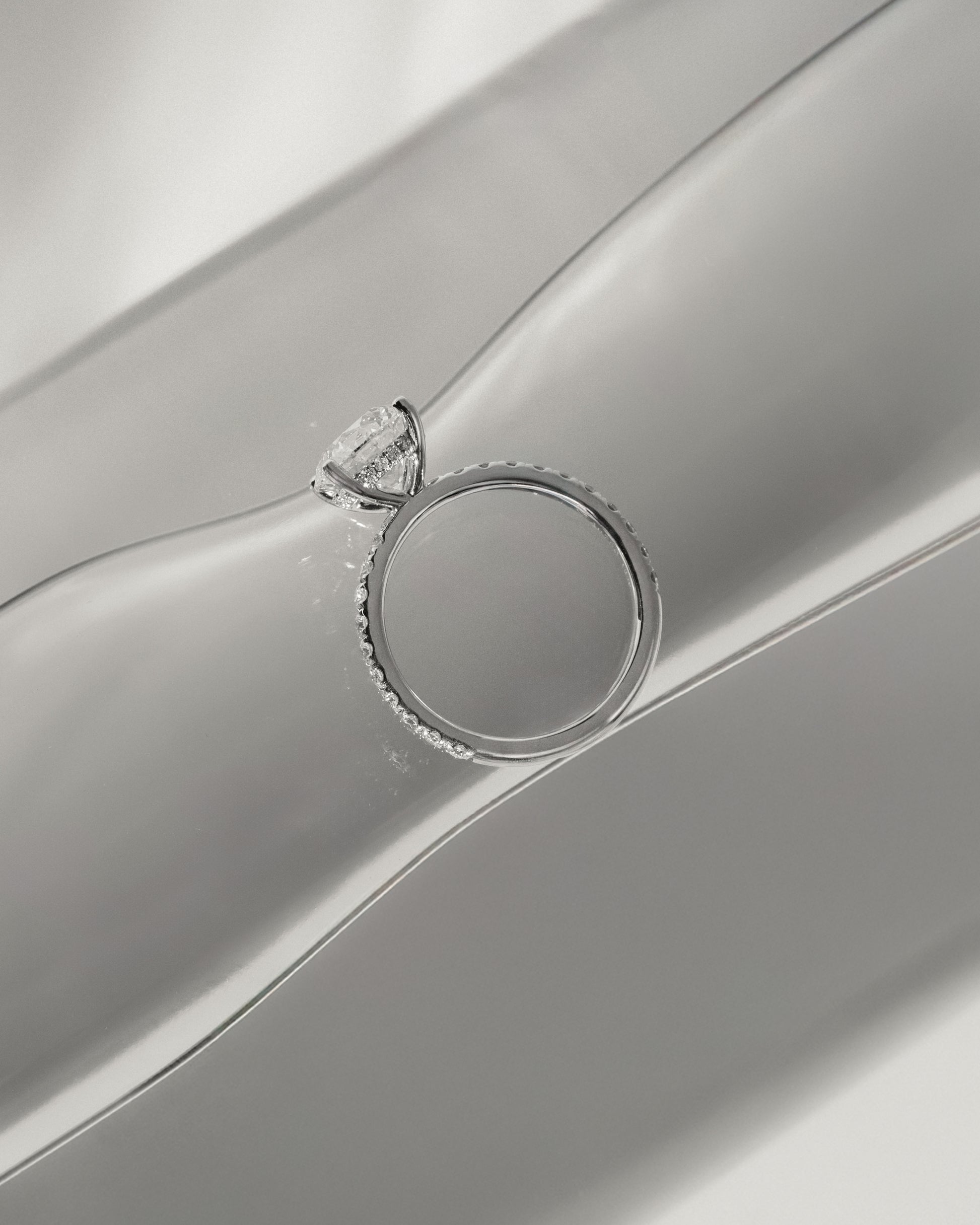 Charlie - Round Claw Solitaire with Hidden Halo and Pave Band Engagement Ring - Rose Two-Tone - Lifestyle