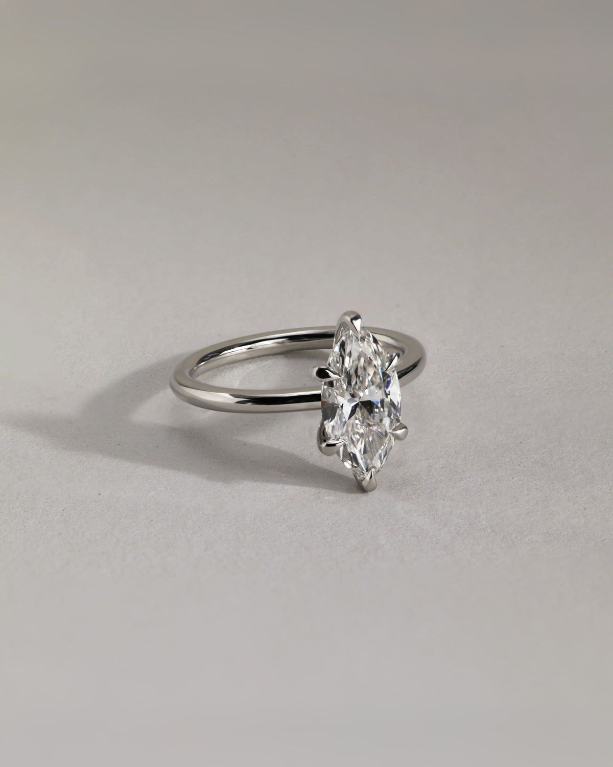 Stephanie - Marquise Claw Solitaire Engagement Ring - Yellow Two-Tone