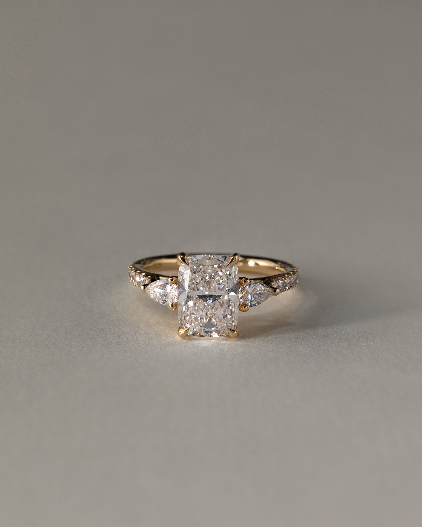 Bree - Elongated Cushion Claw Trilogy with Pear Side Stones and Pave Band Engagement Ring - Rose Two-Tone - Lifestyle