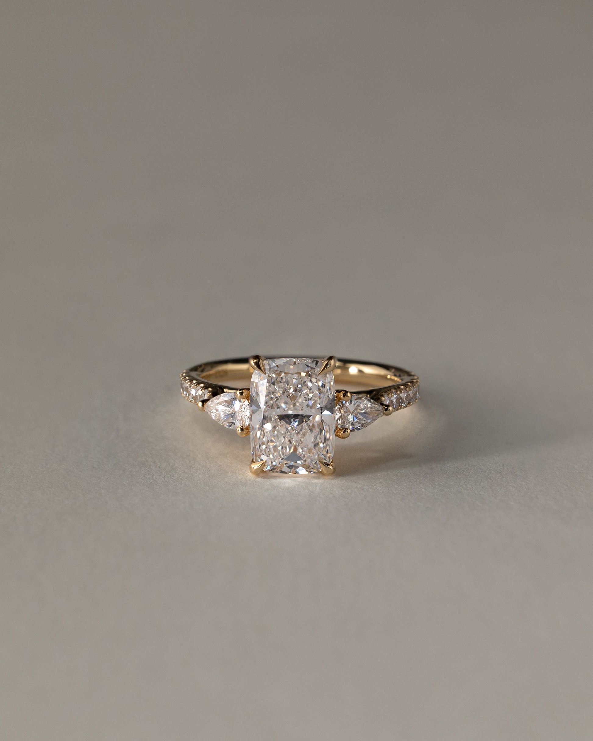 Bree - Elongated Cushion Claw Trilogy with Pear Side Stones and Pave Band Engagement Ring - Rose Two-Tone - Lifestyle