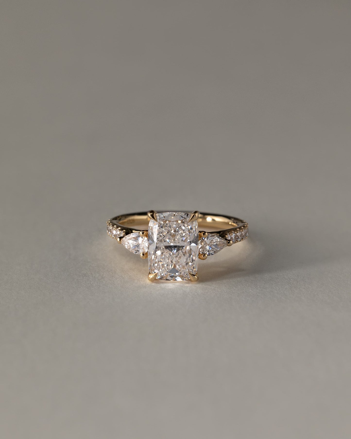 Bree - Elongated Cushion Claw Trilogy with Pear Side Stones and Pave Band Engagement Ring - White Gold