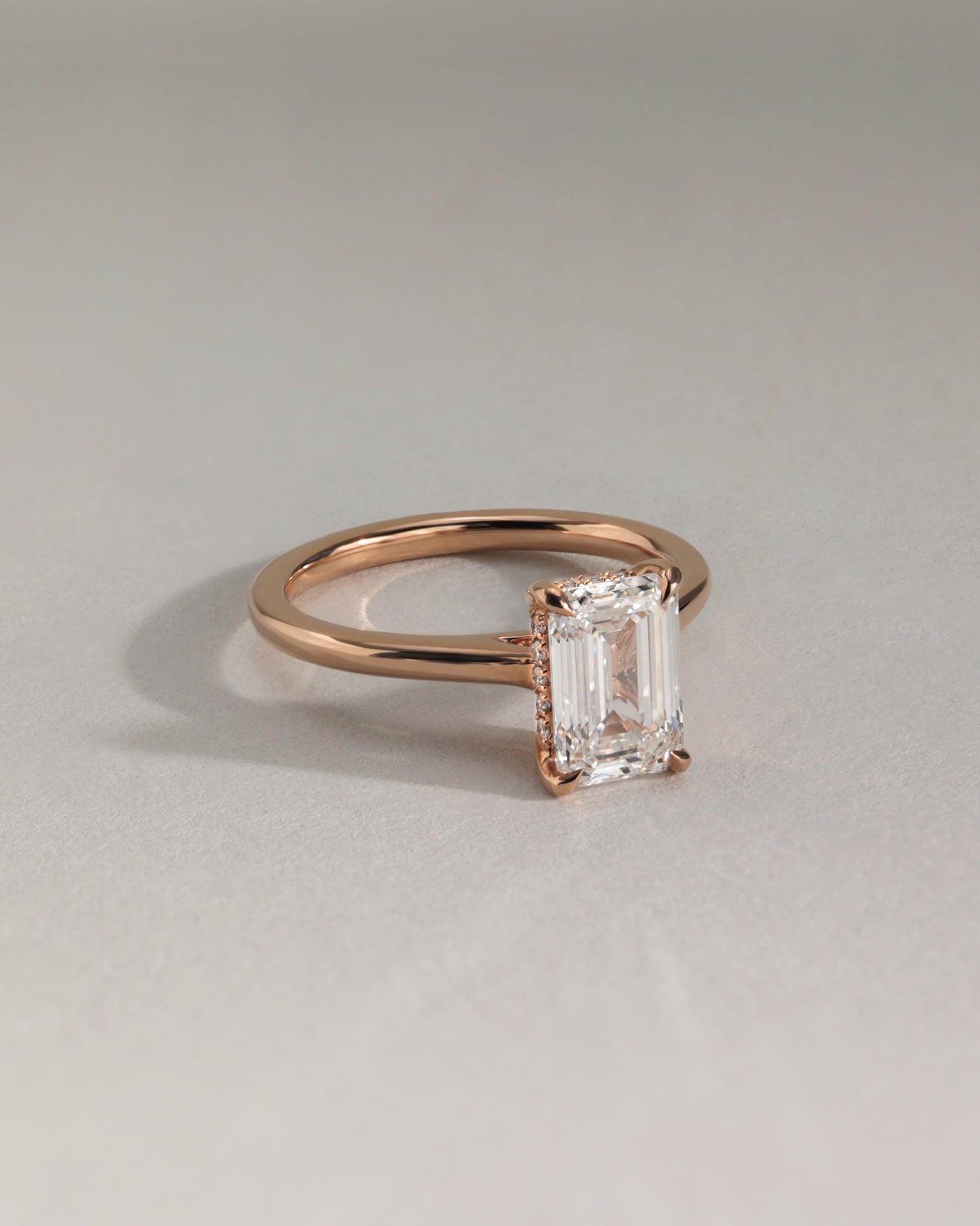 Jane - Emerald Claw Solitaire with Hidden Halo and Cathedral High Setting Engagement Ring - Yellow Two-Tone