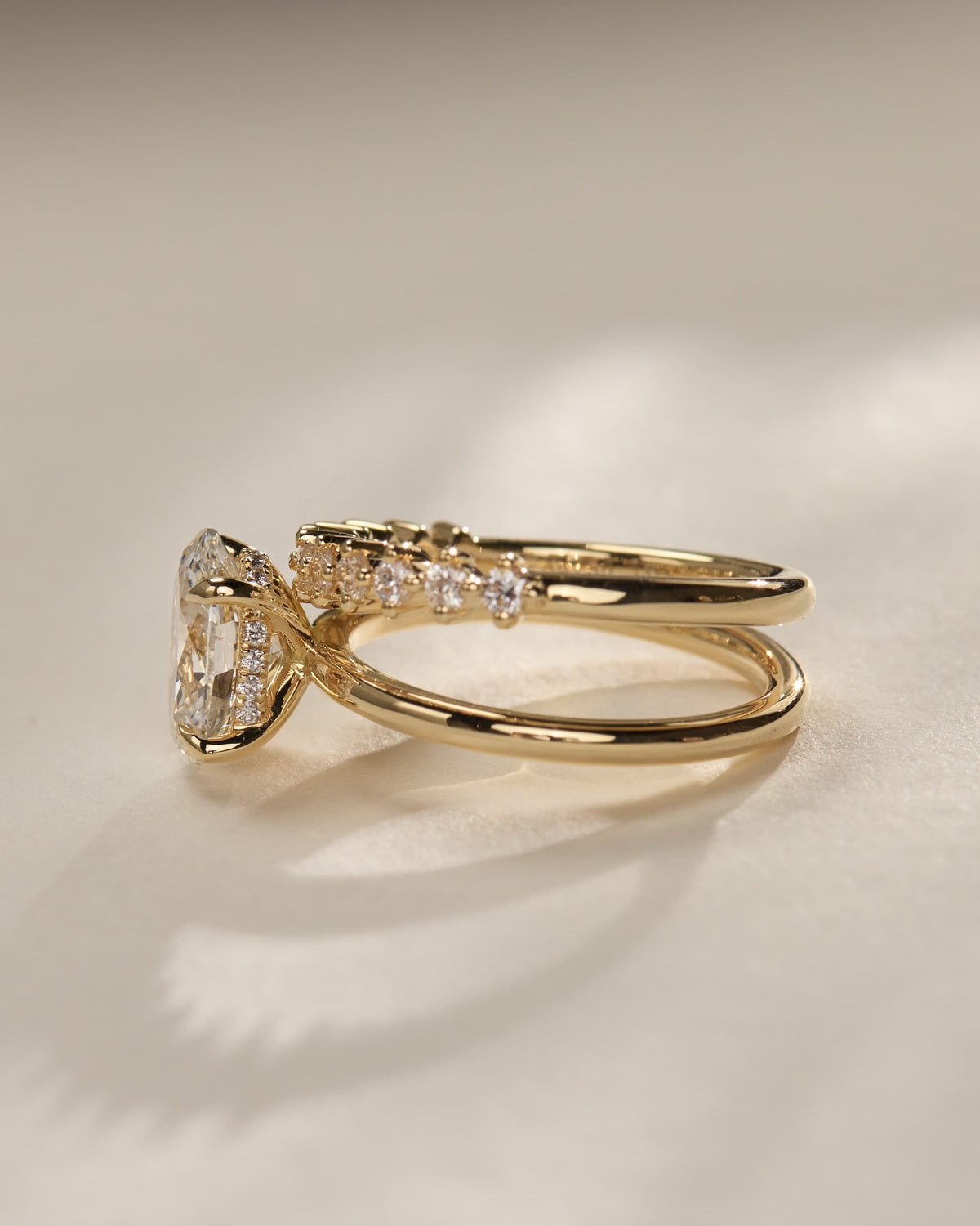 Athena - Oval Claw Solitaire with Double Plain-and-Round-Accent Stones Band Engagement Ring - White Gold
