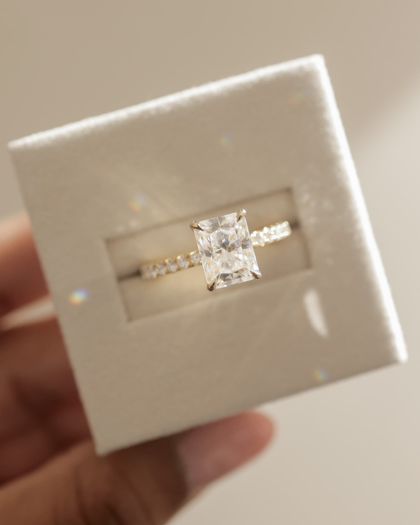 Ellie - Radiant Claw Solitaire with Wrap Around Hidden Halo and Pave Band Engagement Ring - Yellow Gold
