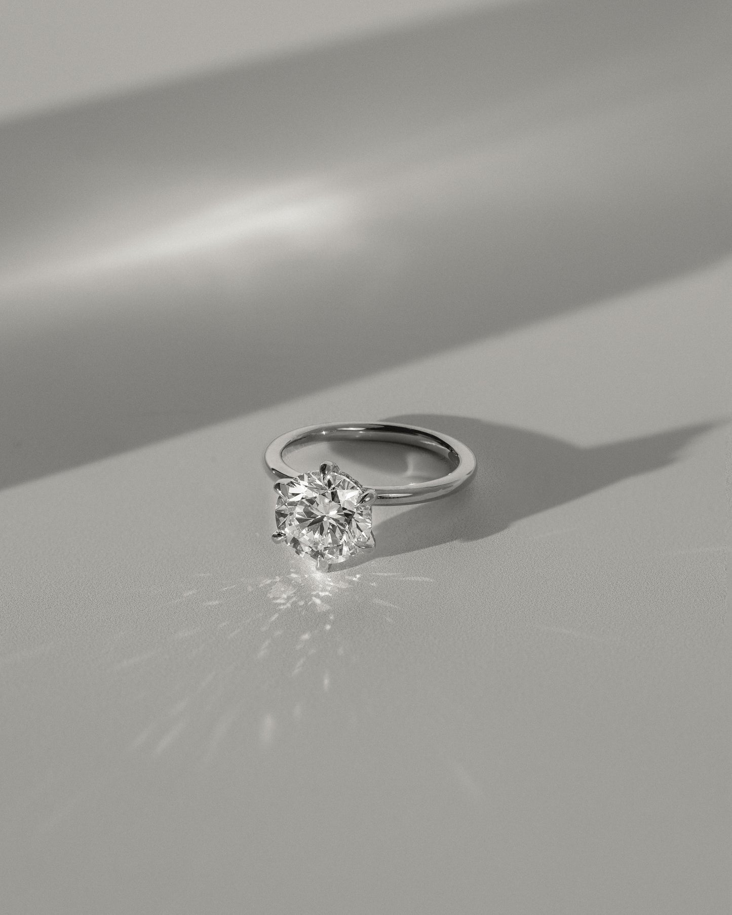 Anna - Round Claw Solitaire with Hidden Halo Engagement Ring - Rose Two-Tone - Lifestyle