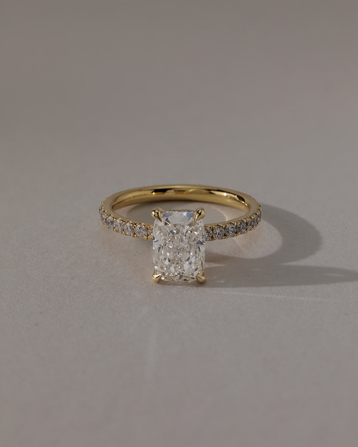 Camilla - Elongated Cushion Claw Solitaire with Hidden Halo and Pave Band Engagement Ring - Yellow Gold