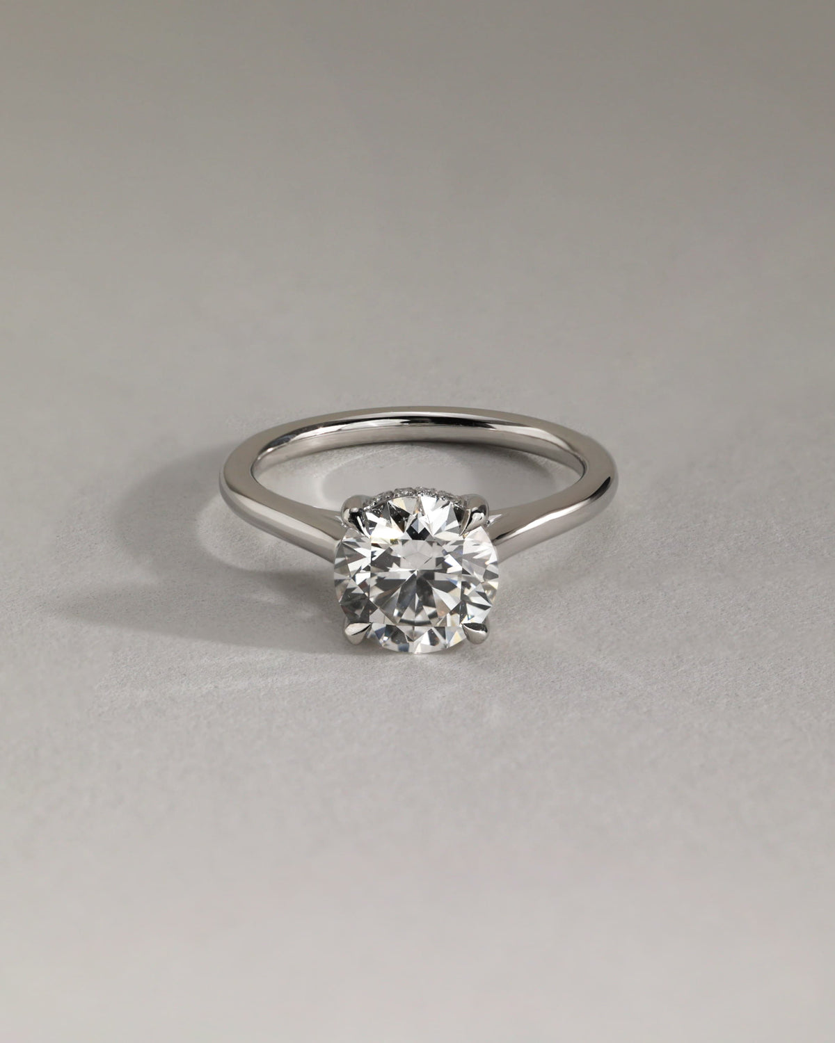 Bonnie - Round Claw Solitaire with Hidden Halo and Cathedral High Setting Engagement Ring - Yellow Gold