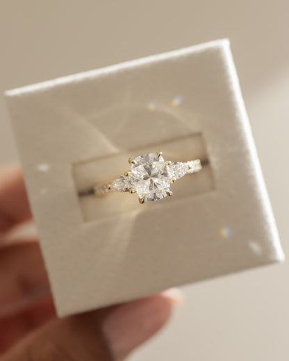 Bree - Elongated Cushion Claw Trilogy with Pear Side Stones and Pave Band Engagement Ring - Platinum