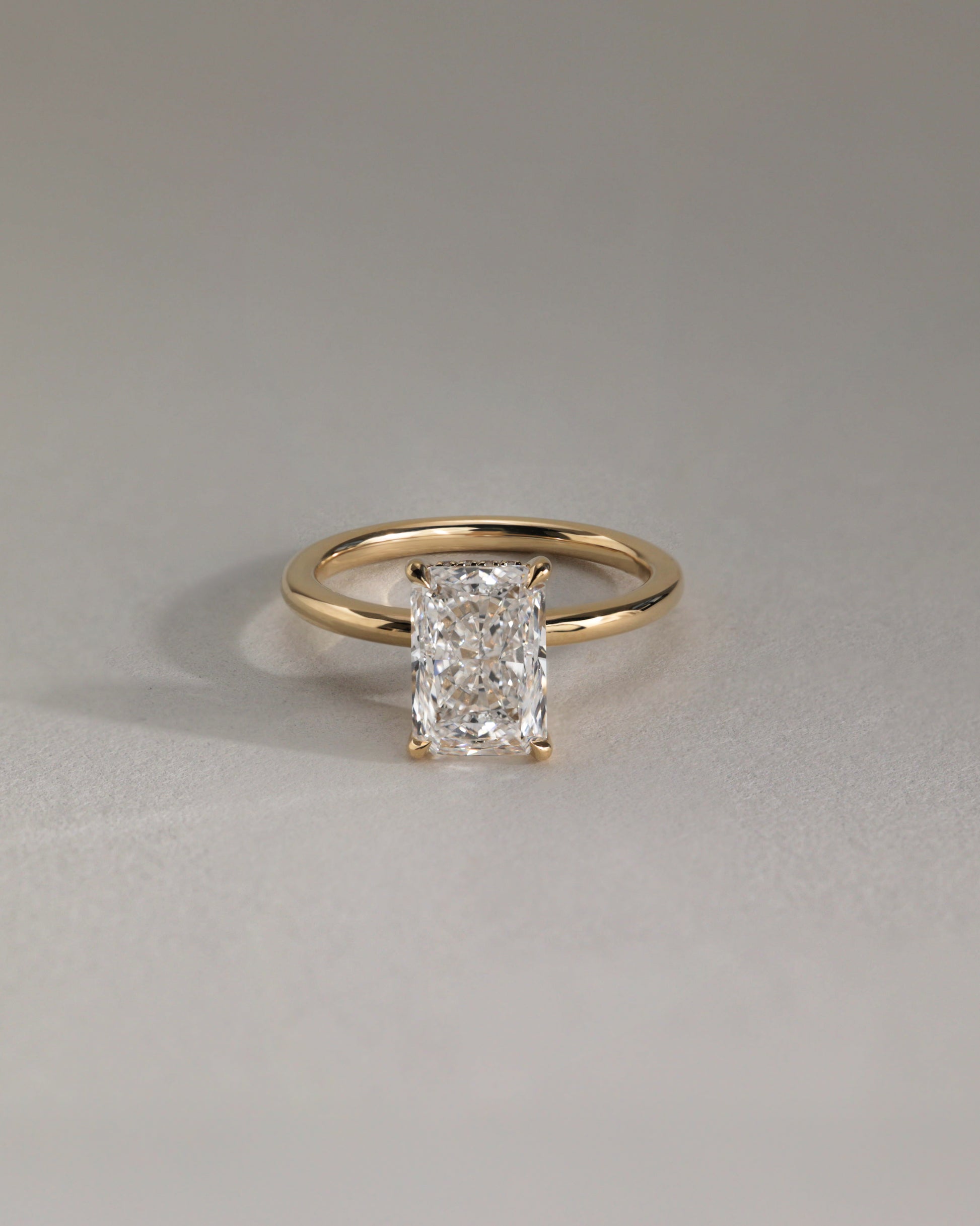 Carly - Radiant Claw Solitaire with Hidden Halo Engagement Ring - Rose Two-Tone - Lifestyle