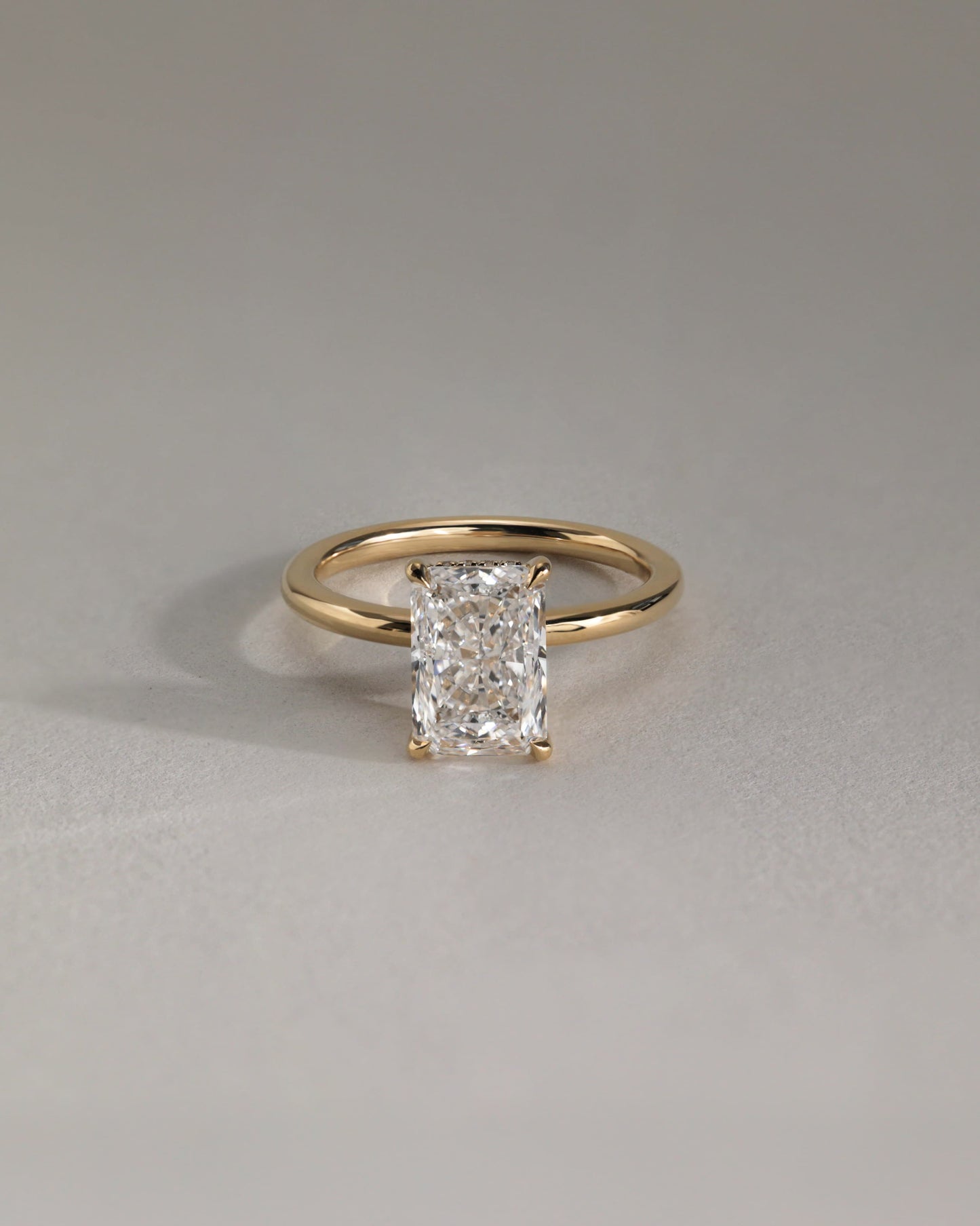 Carly - Radiant Claw Solitaire with Hidden Halo Engagement Ring - Yellow Gold