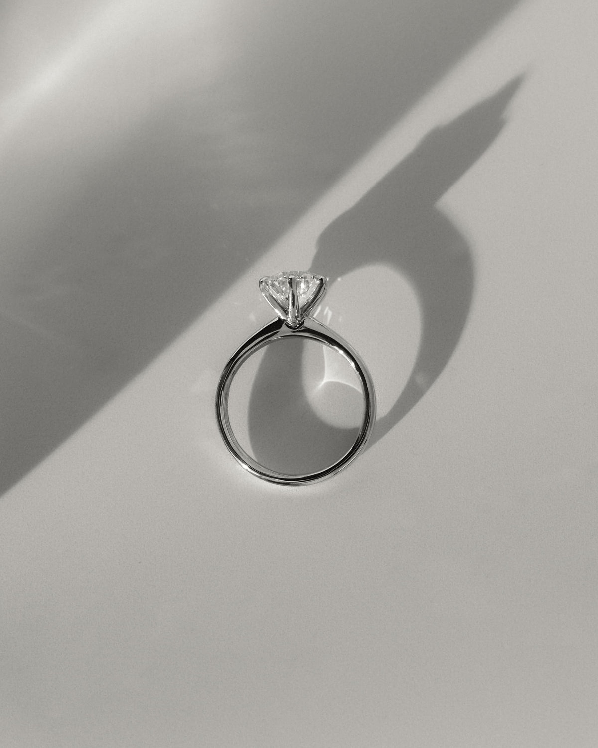 Daniela - Round Claw Solitaire with Solid Cathedral High Setting Engagement Ring - Yellow Gold