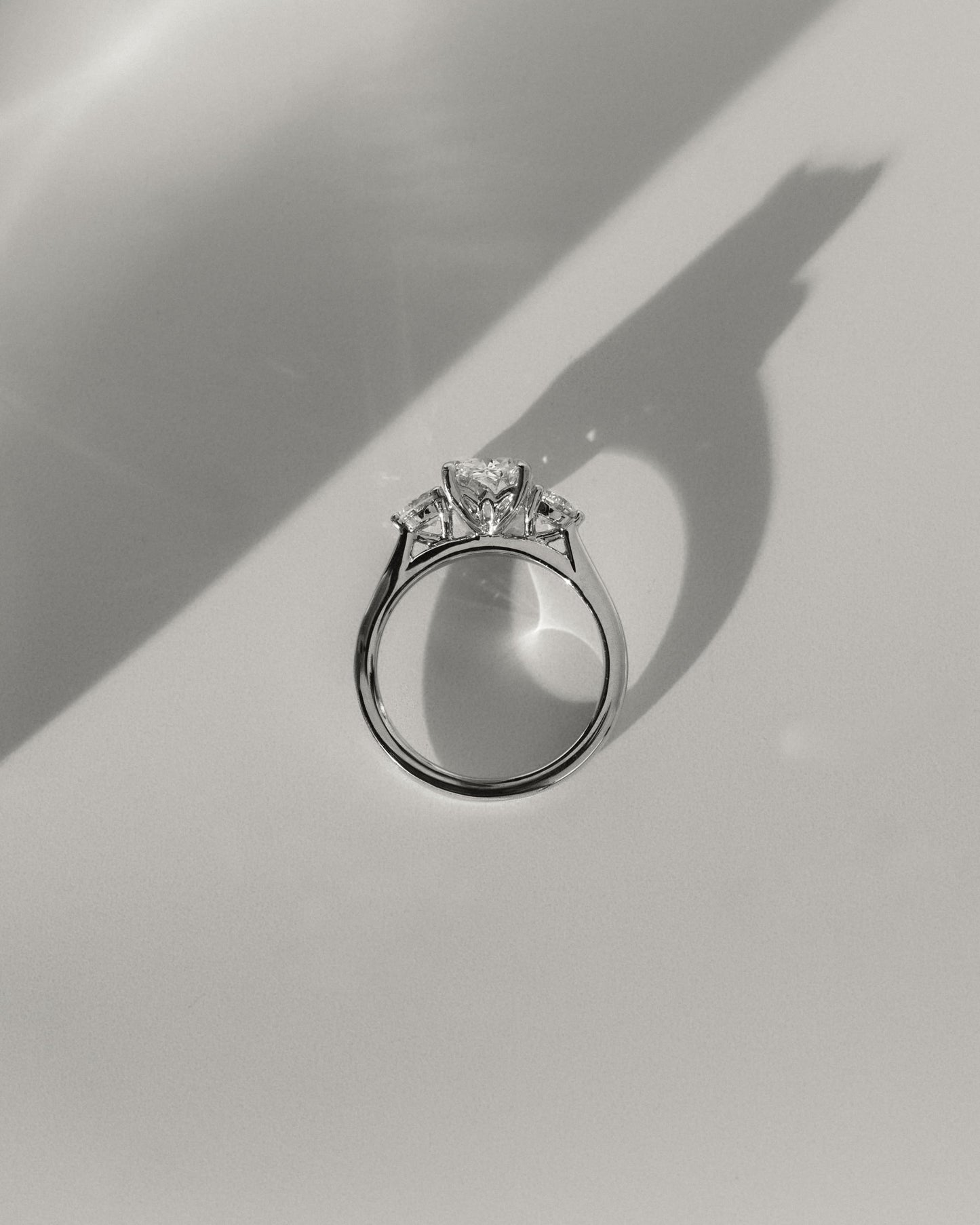 Charmaine - Elongated Cushion Claw Trilogy with Round Side Stones and Lily Detail Engagement Ring - Yellow Gold