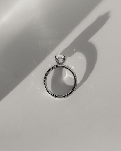 Paige - Oval Claw Solitaire with Hidden Halo and Pave Band Engagement Ring - Platinum