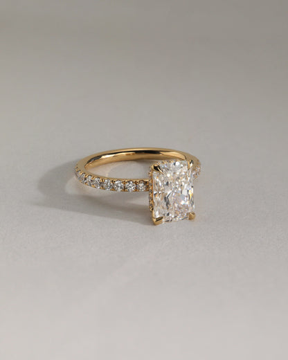Ellie - Radiant Claw Solitaire with Wrap Around Hidden Halo and Pave Band Engagement Ring - Yellow Gold