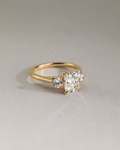 Charmaine - Elongated Cushion Claw Trilogy with Round Side Stones and Lily Detail Engagement Ring - Yellow Gold