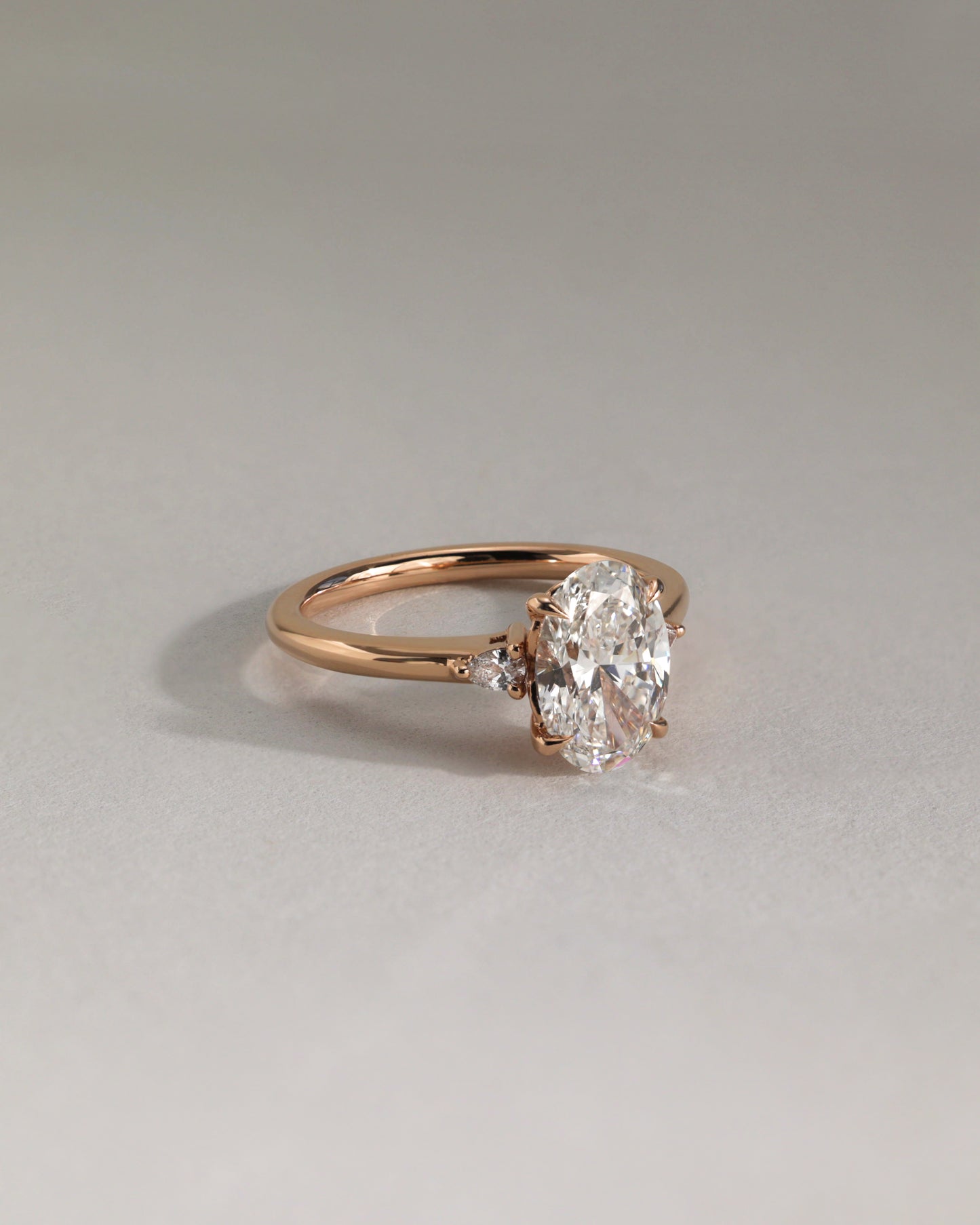 Elena - Oval Claw Trilogy with Pear Side Stones and Tulip Detail Engagement Ring - Rose Two-Tone - Lifestyle