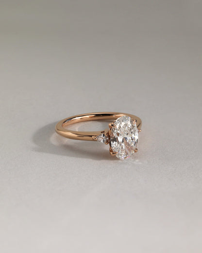 Elena - Oval Claw Trilogy with Pear Side Stones and Tulip Detail Engagement Ring - Yellow Gold