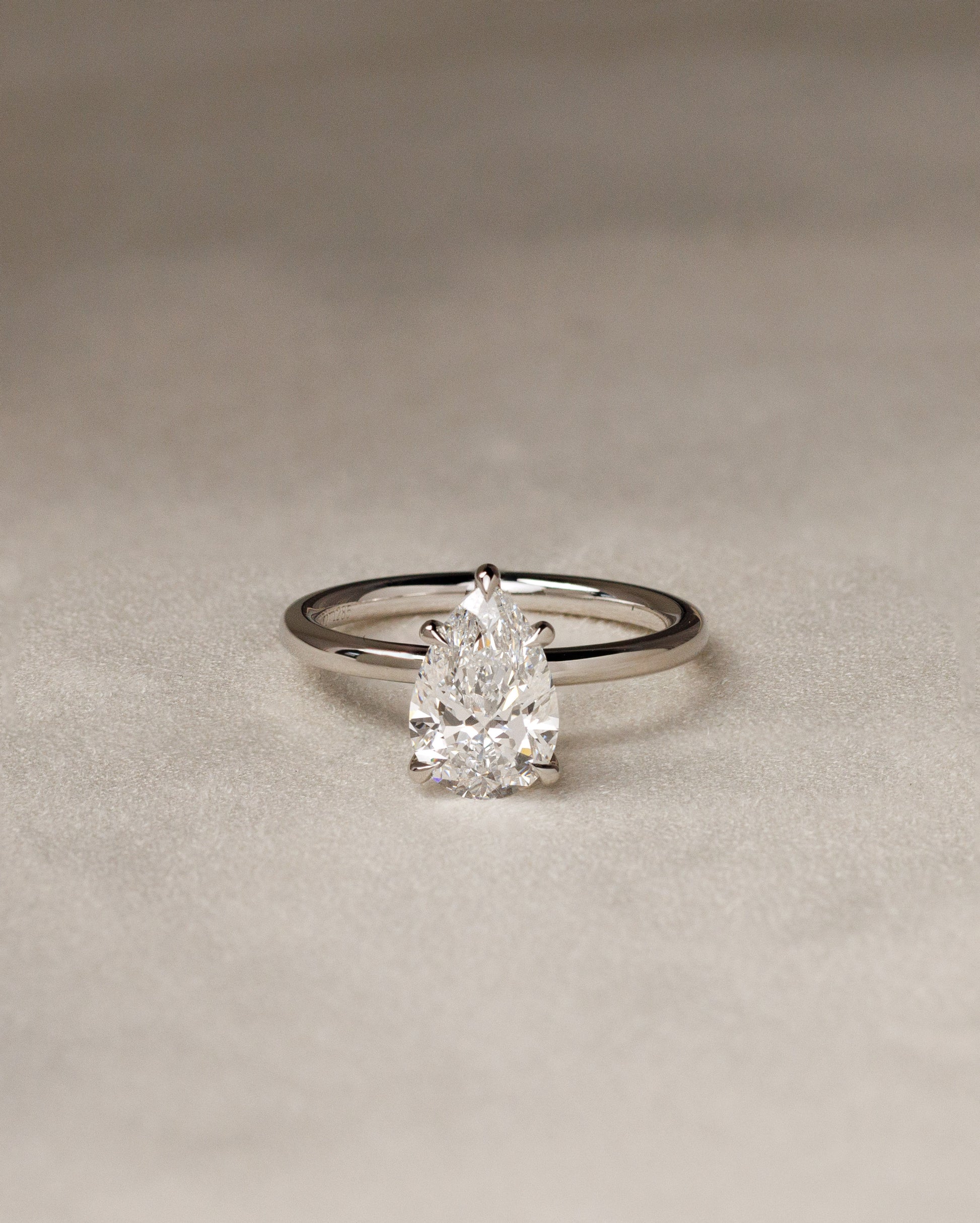 Alia - Pear Claw Solitaire Engagement Ring - Rose Two-Tone - Lifestyle