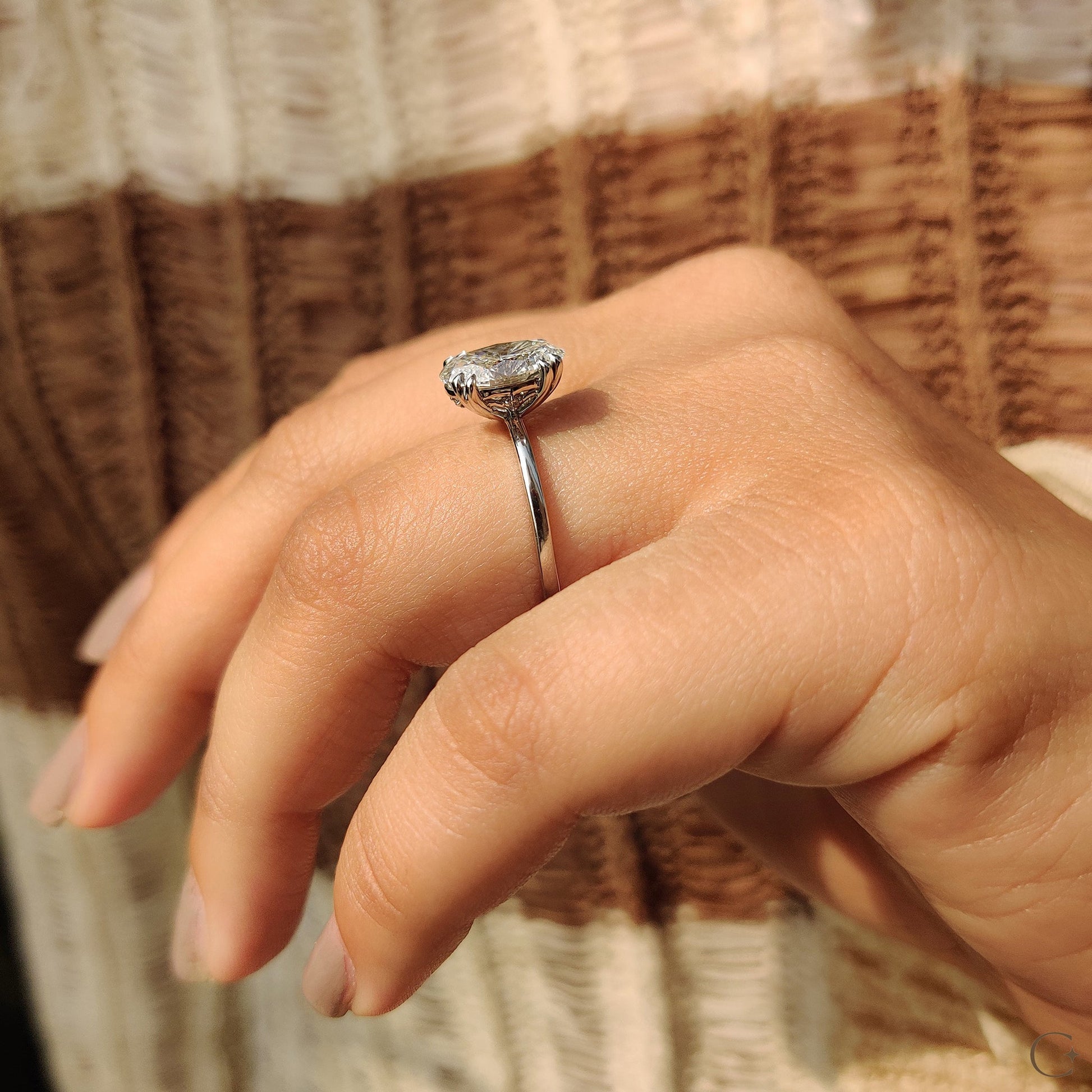 Oval Shaped Diamond Engagement Ring In Solitaire Style
