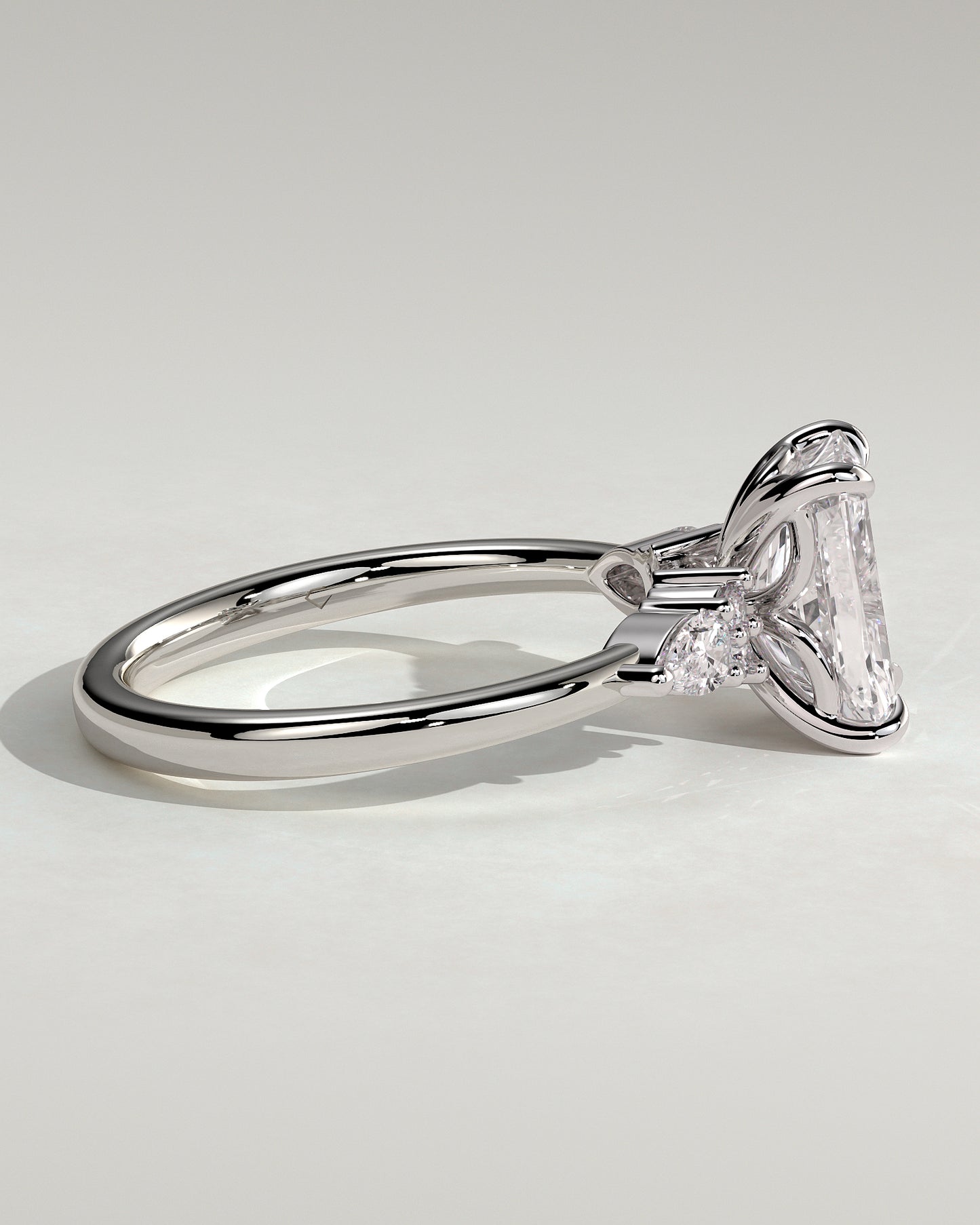 Heidi - Radiant Claw Solitaire with Pear Accents and Round Shoulder Stones Engagement Ring - Platinum - White Gold / Platinum 2ct