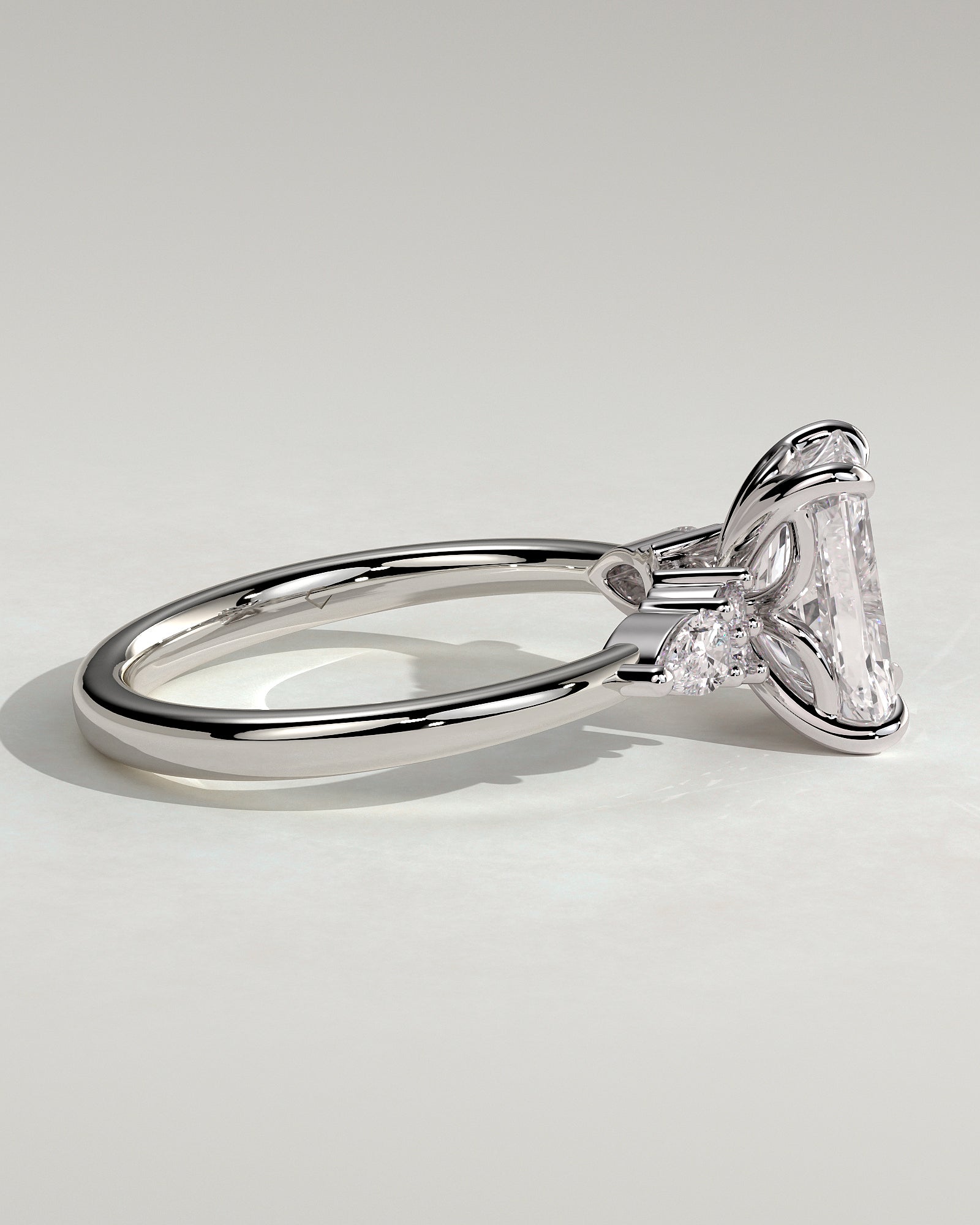 Heidi - Radiant Claw Solitaire with Pear Accents and Round Shoulder Stones Engagement Ring - Platinum - White Gold / Platinum 2ct