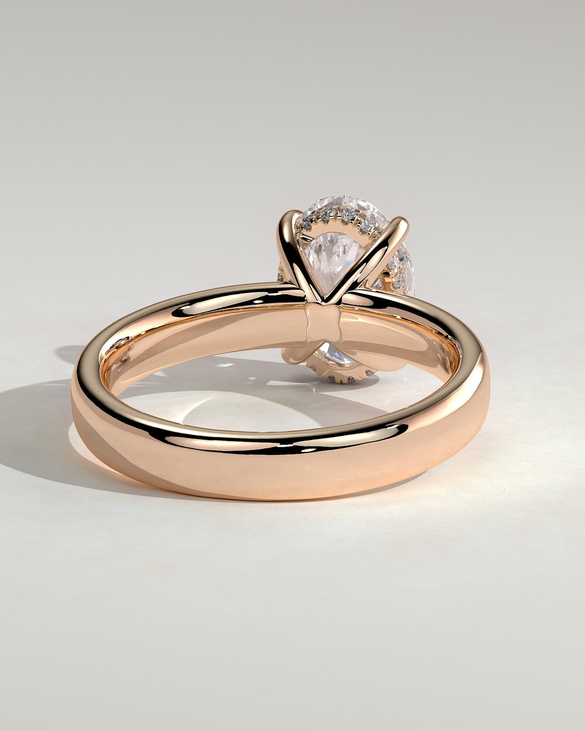 Bronte - Oval Claw Solitaire with Cigar Band and Hidden Halo Engagement Ring - Rose Gold