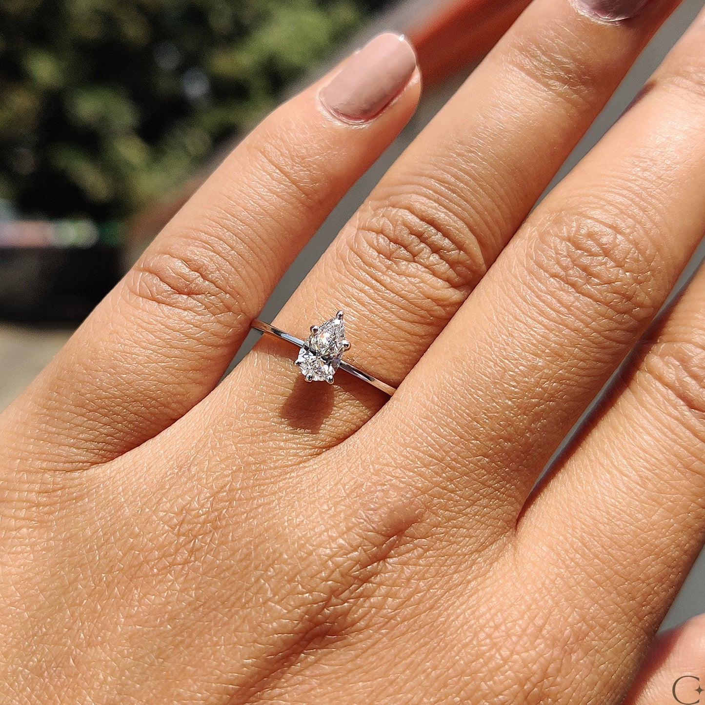 Pear Shaped Diamond Ring In Solitaire Style