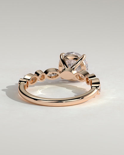 Cartia - Round Claw Solitaire with Round-Marquise Bezel Accent Stones Engagement Ring - Rose Gold