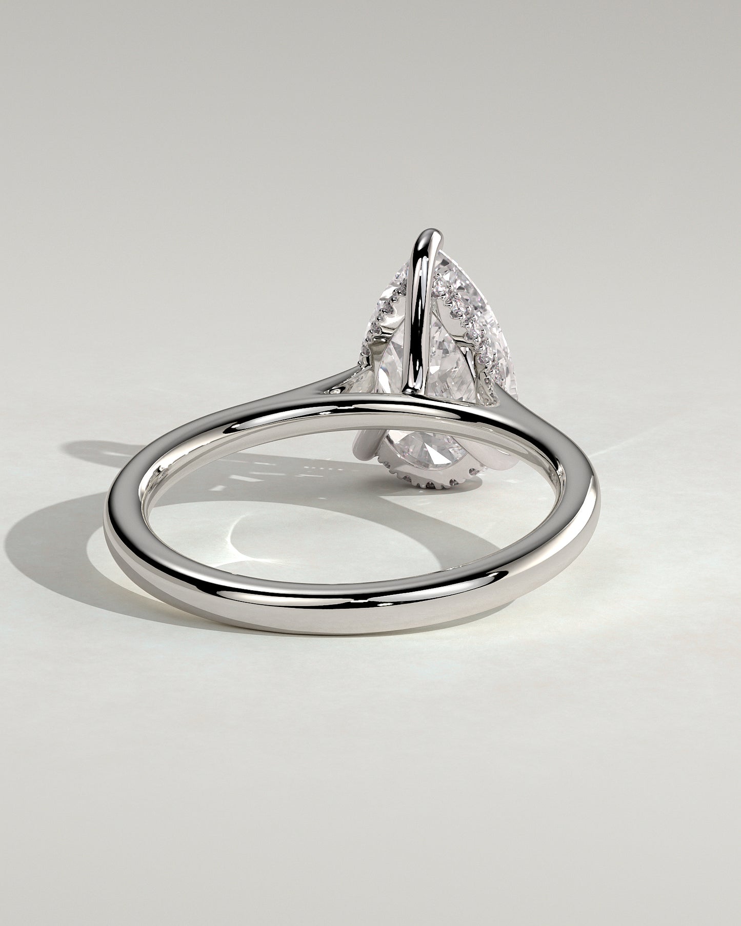 Courtney - Pear Claw Solitaire with Hidden Halo, Tapered Band and Cathedral High Setting Engagement Ring - Platinum - White Gold / Platinum 2ct